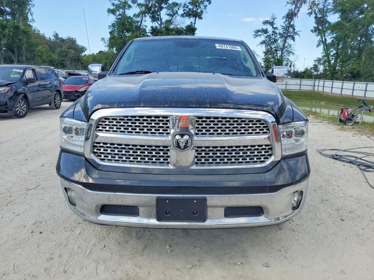 2015 Ram 1500 Laramie Black vin: 1C6RR6NM7FS715003