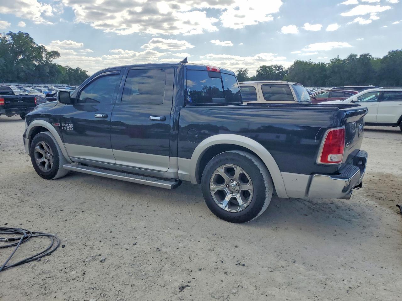 2015 Ram 1500 Laramie Black vin: 1C6RR6NM7FS715003