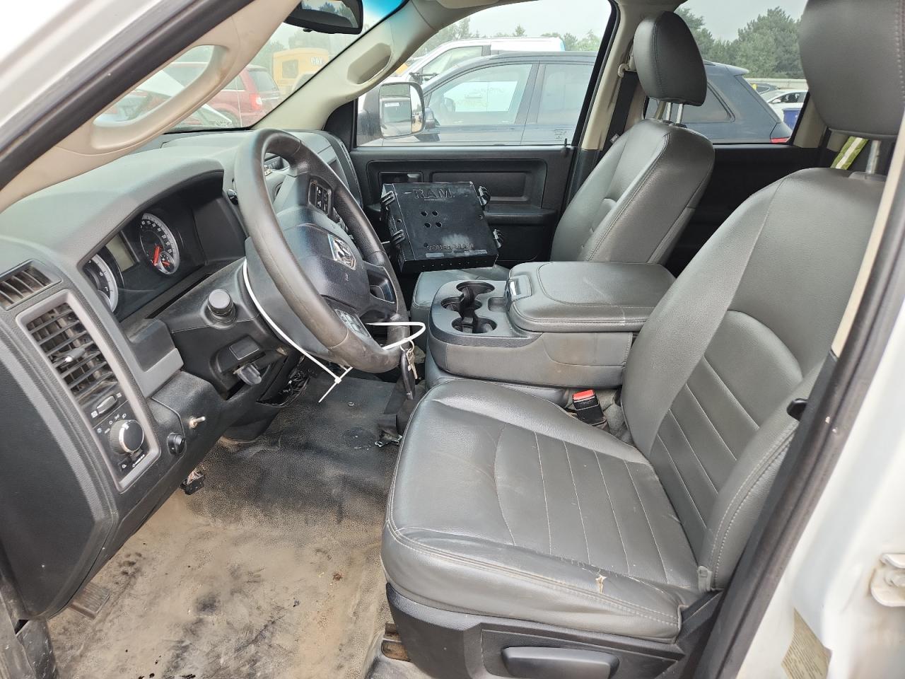2014 Ram 1500 St White vin: 1C6RR7FT3ES323033 Damage: Left Front Seat Cushion, Torn, 2 To 3 Inches