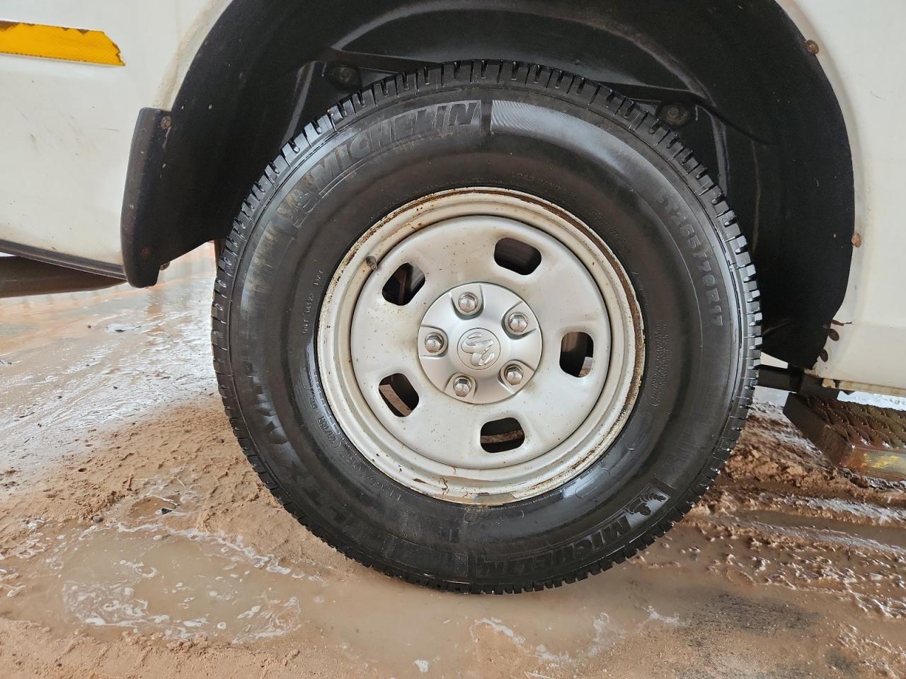 2014 Ram 1500 St White vin: 1C6RR7FTXES323031 Damage: Right Rear Wheel, Corrosion, > 12 Inches
