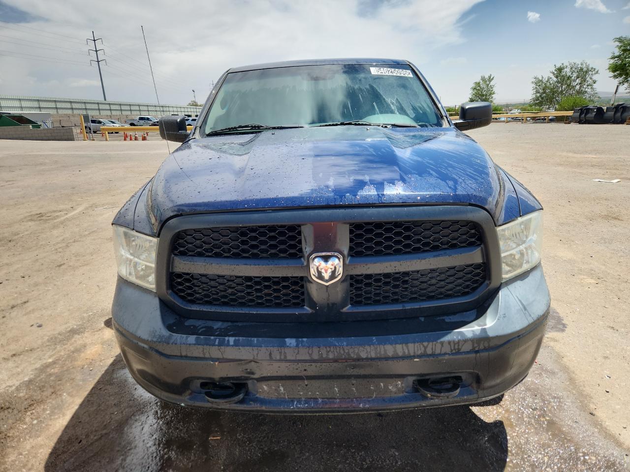 2015 Ram 1500 St Blue vin: 1C6RR7KG6FS789341 Damage: Left Head Lamp, Faded, Repair Required