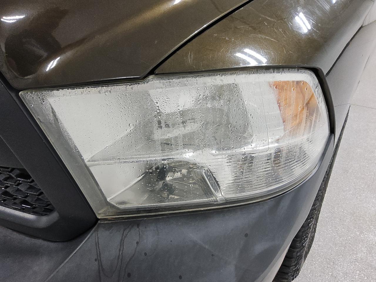2013 Ram 1500 St Brown vin: 1C6RR7KGXDS666574 Damage: Left Head Lamp, Water Damage, Replacement Required