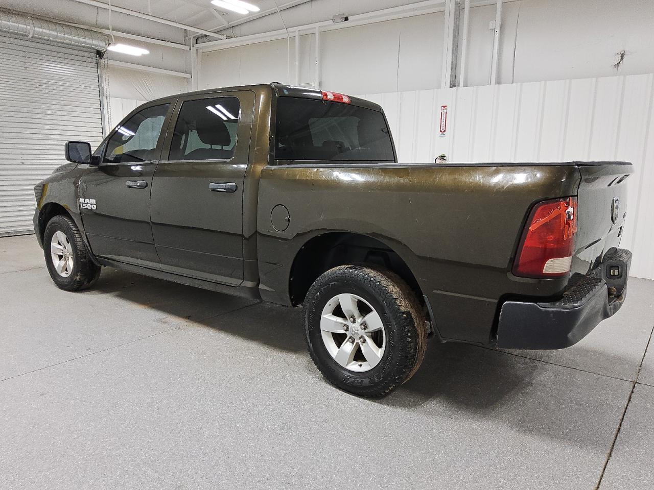 2013 Ram 1500 St Brown vin: 1C6RR7KGXDS666574 Damage: Left Rear Tire, Worn, Replacement Required
