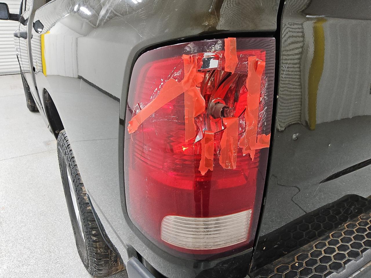 2013 Ram 1500 St Brown vin: 1C6RR7KGXDS666574 Damage: Left Tail Light, Broken, Replacement Required