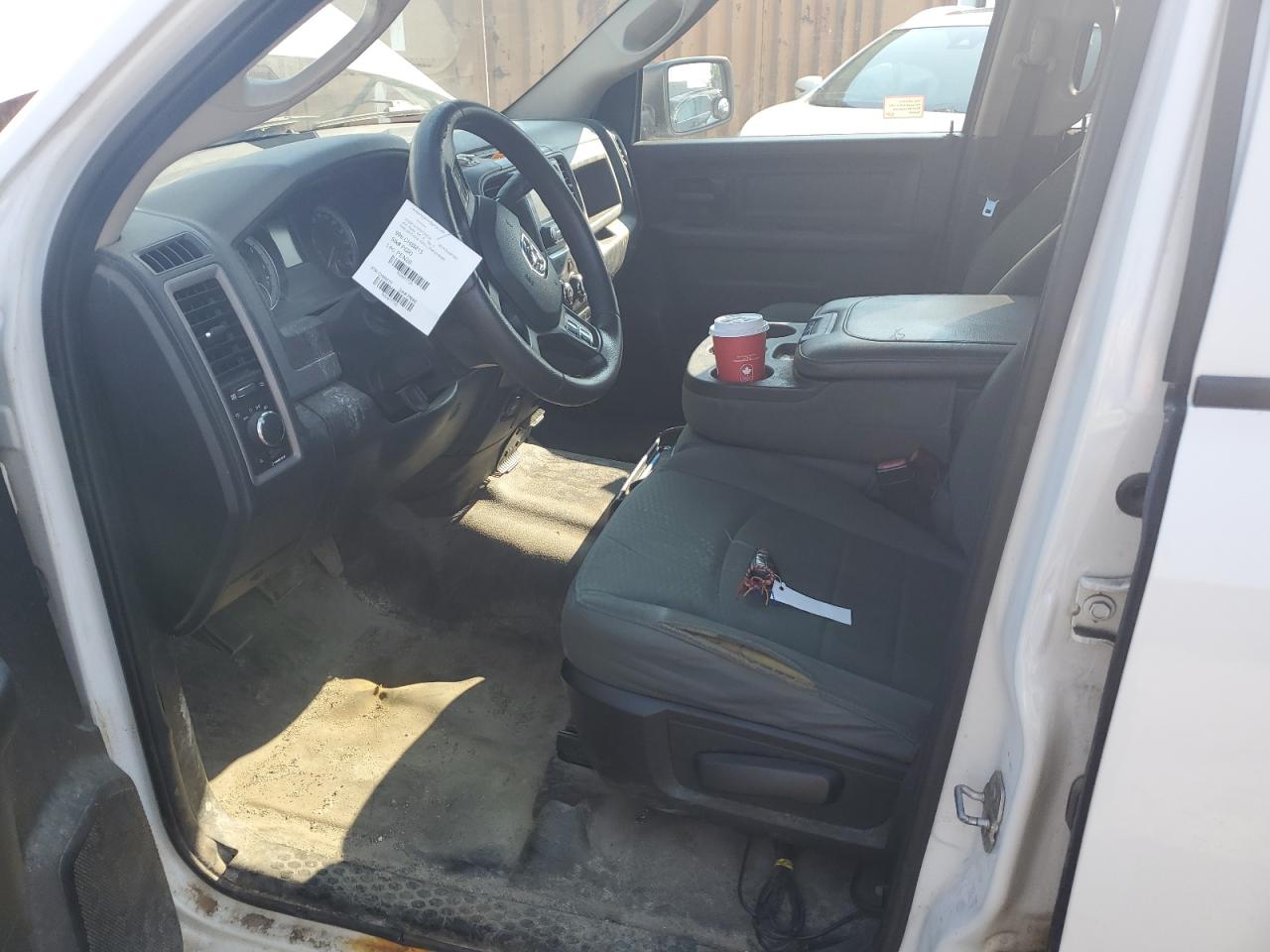 2015 Ram 1500 St White vin: 1C6RR7KT3FS726534 Damage: Left Front Seat Cushion, Torn, > 12 Inches