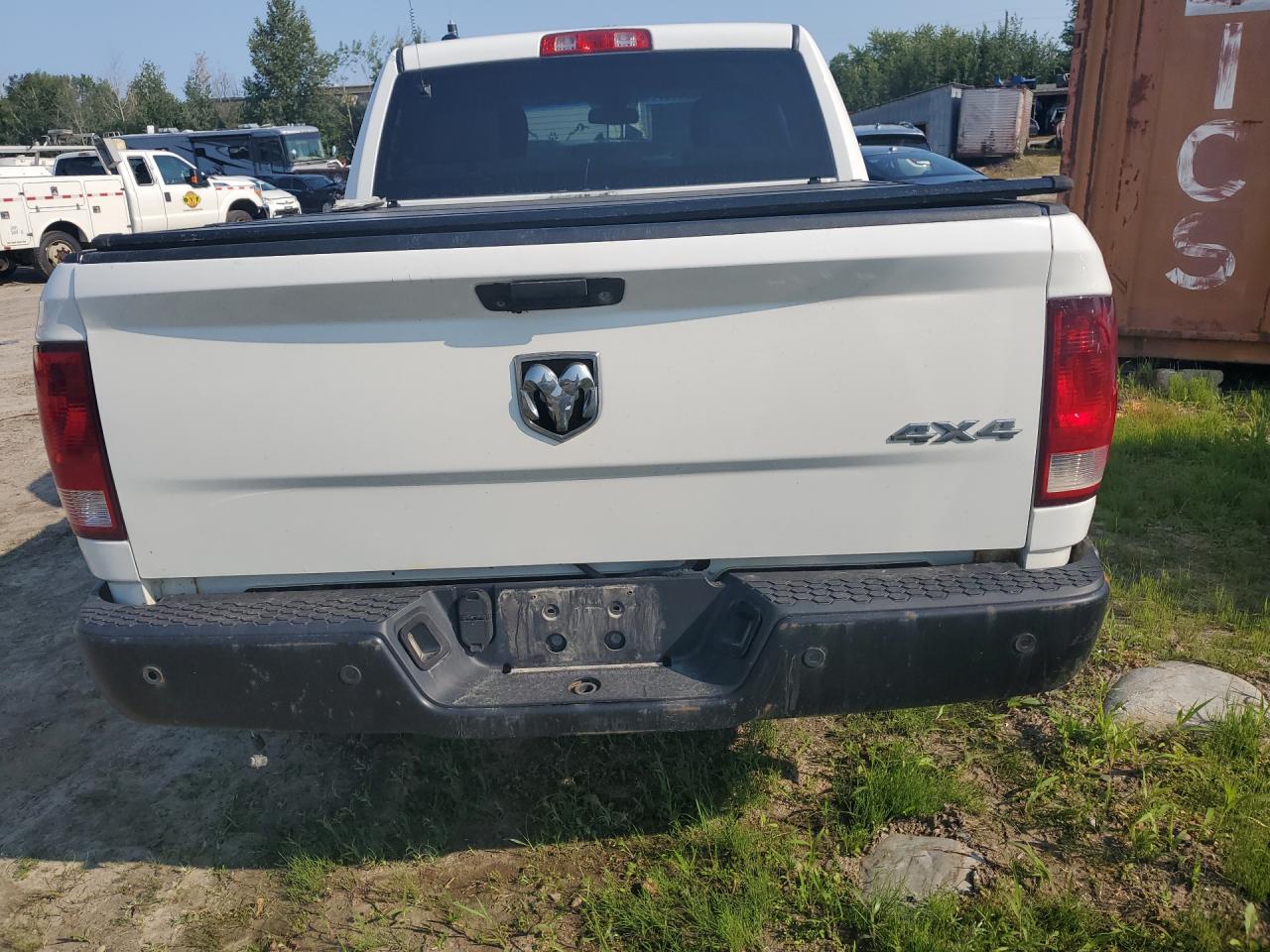 2015 Ram 1500 St White vin: 1C6RR7KT3FS726534 Damage: Rear Metal Bumper Painted, Rust, > 12 Inches