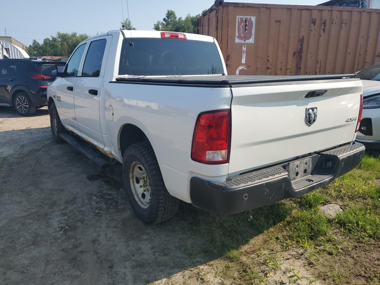 2015 Ram 1500 St White vin: 1C6RR7KT3FS726534 Damage: Cab - Left, Dent(S) W/ Paint Dmg, 3 To 4 Inches