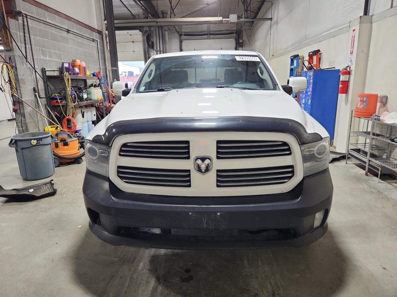 2013 Ram 1500 Sport White vin: 1C6RR7MT8DS552132 Damage: Left Head Lamp, Faded, Repair Required