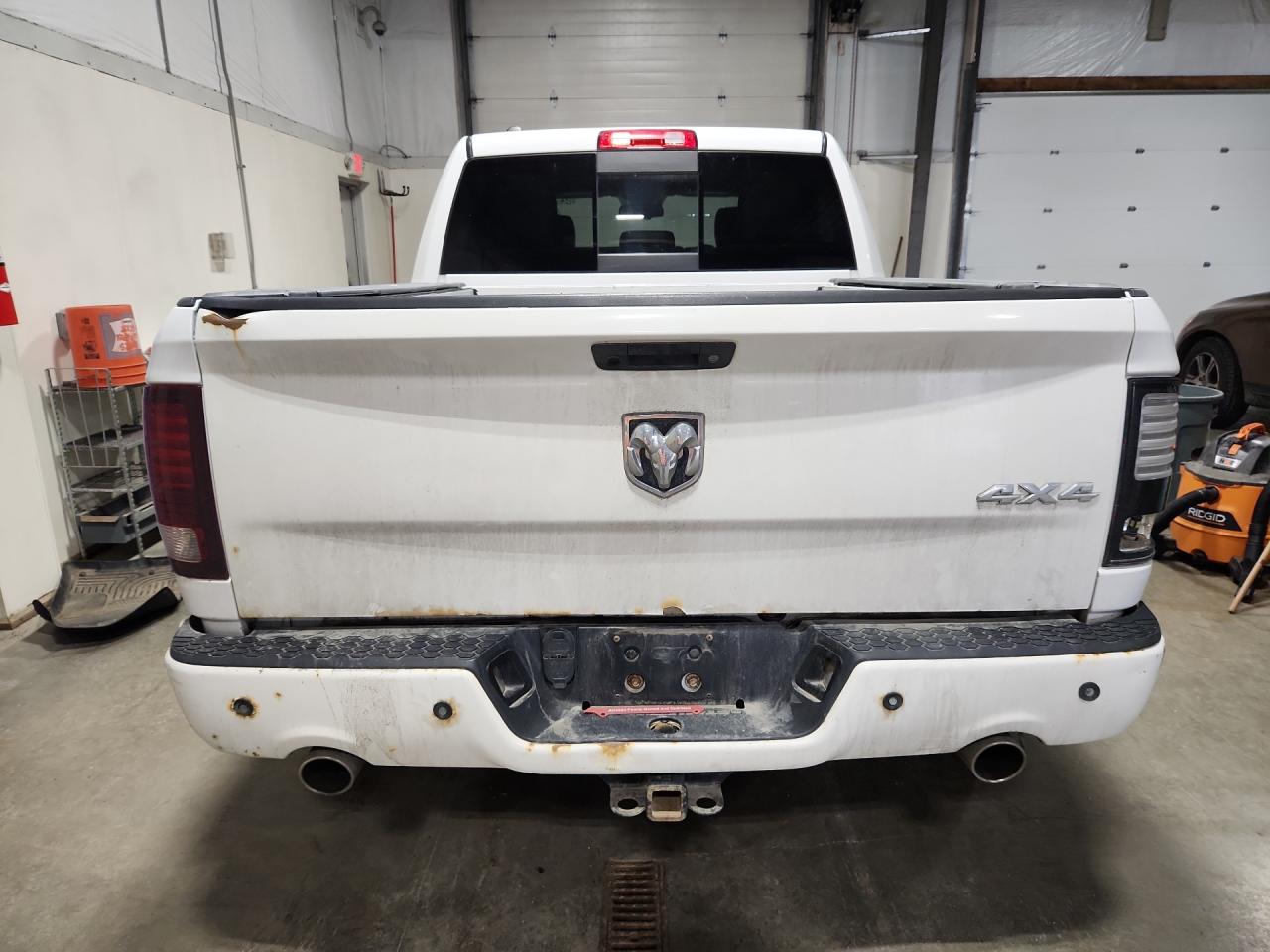 2013 Ram 1500 Sport White vin: 1C6RR7MT8DS552132 Damage: Tailgate, Rust, > 12 Inches