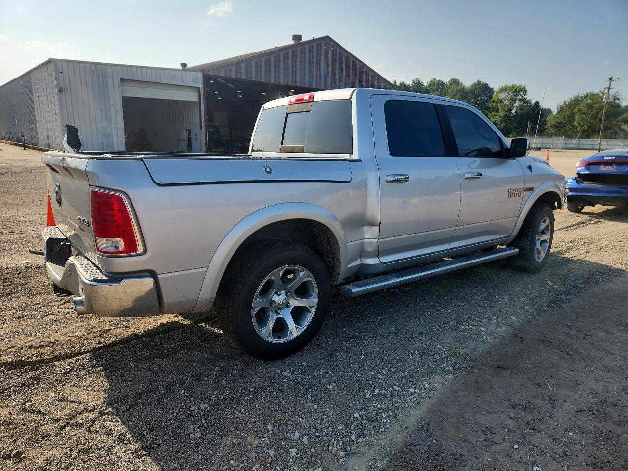 2015 Ram 1500 Laramie Silver vin: 1C6RR7NM1FS552404