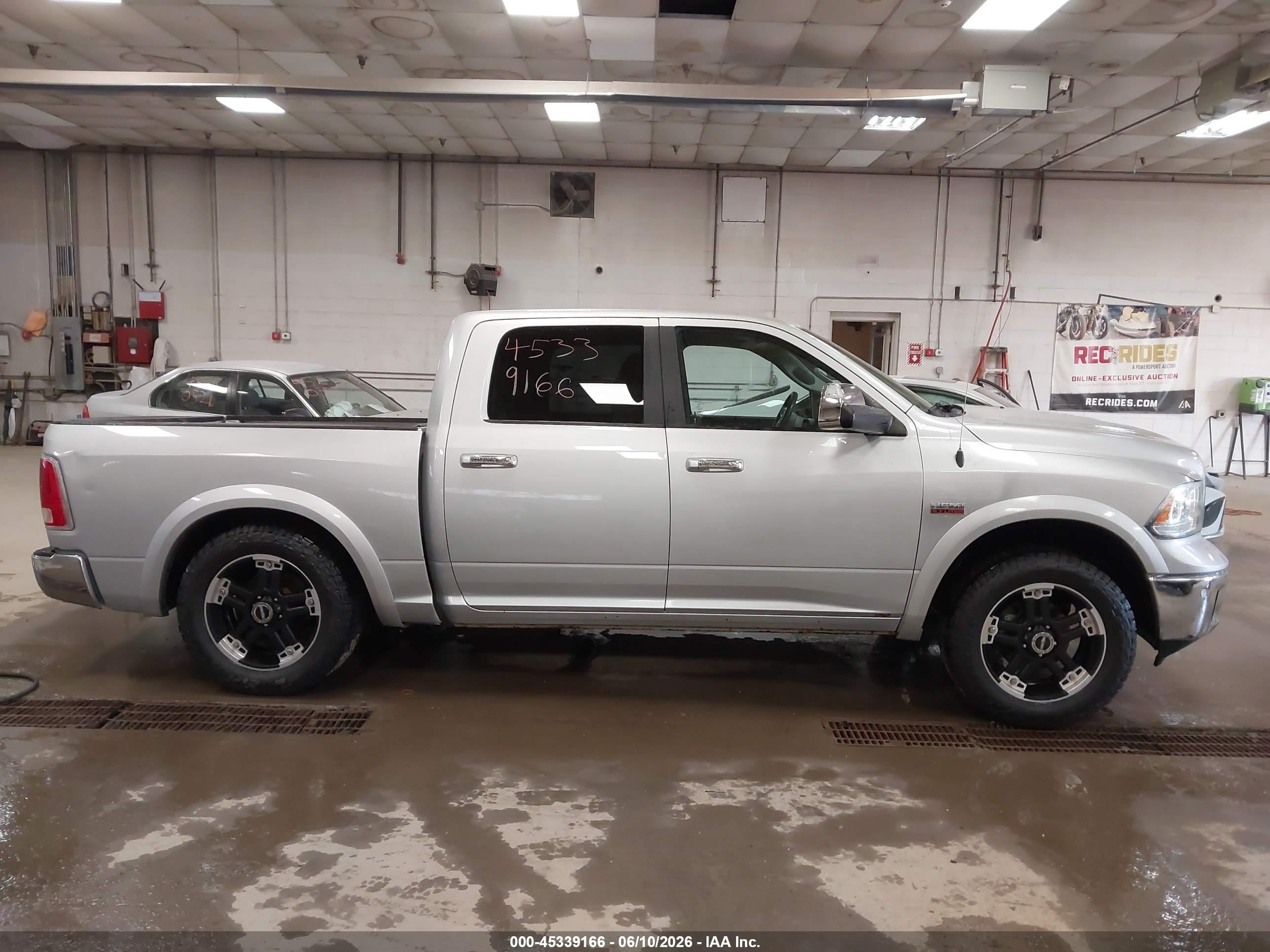 2014 Ram 1500 Laramie Silver vin: 1C6RR7NT7ES247804