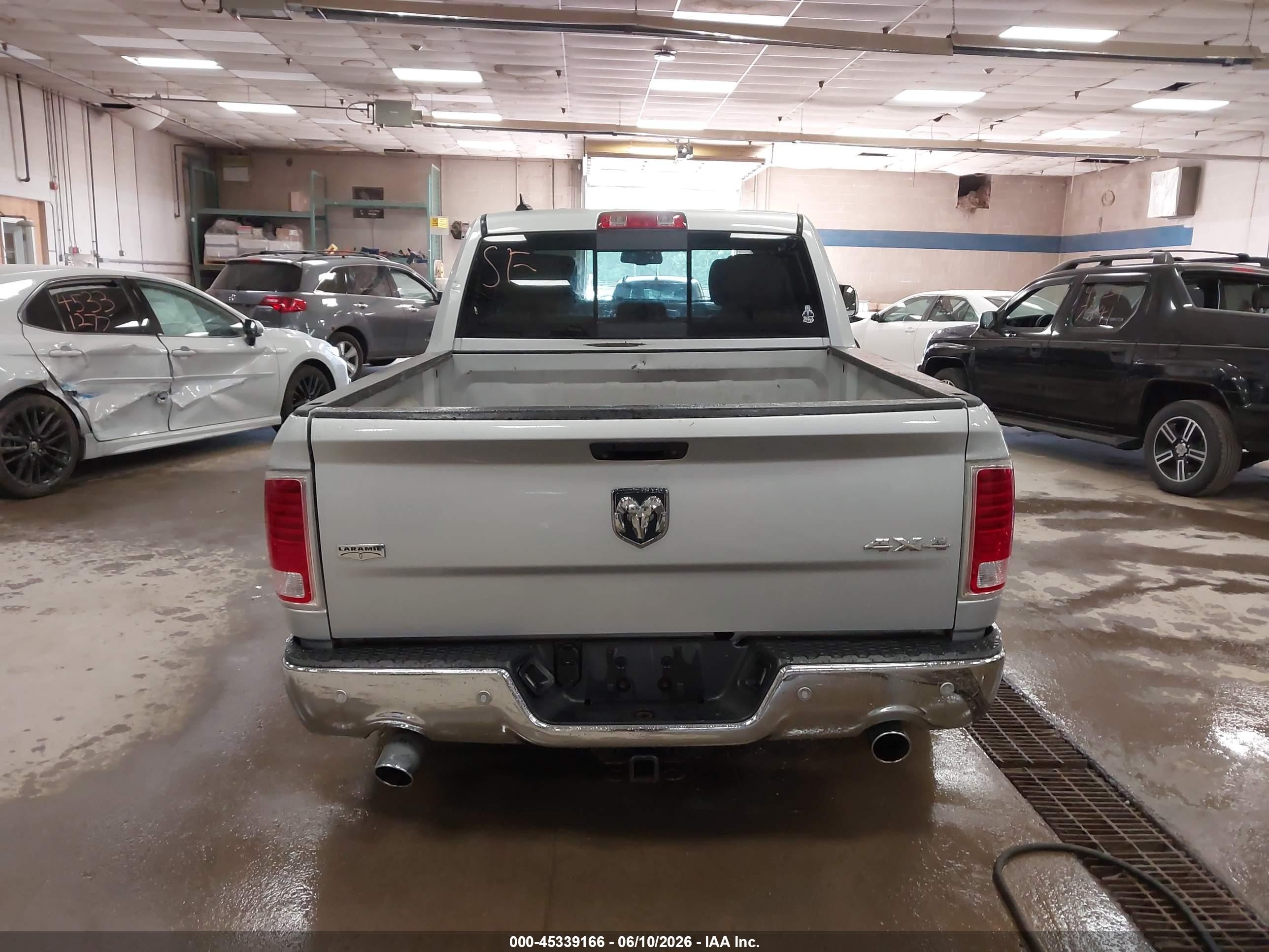 2014 Ram 1500 Laramie Silver vin: 1C6RR7NT7ES247804