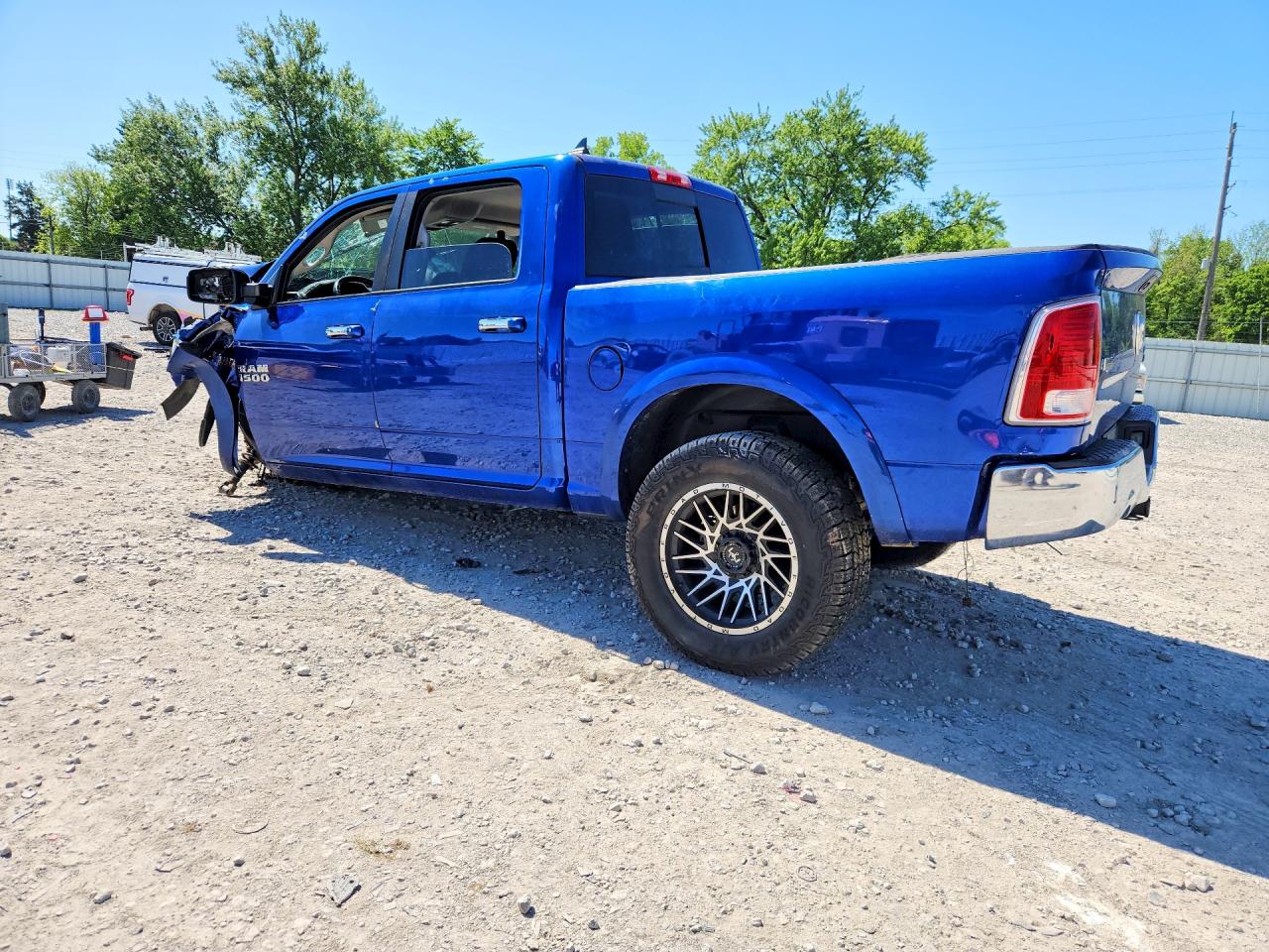 2015 Ram 1500 Laramie Blue vin: 1C6RR7NT8FS777118