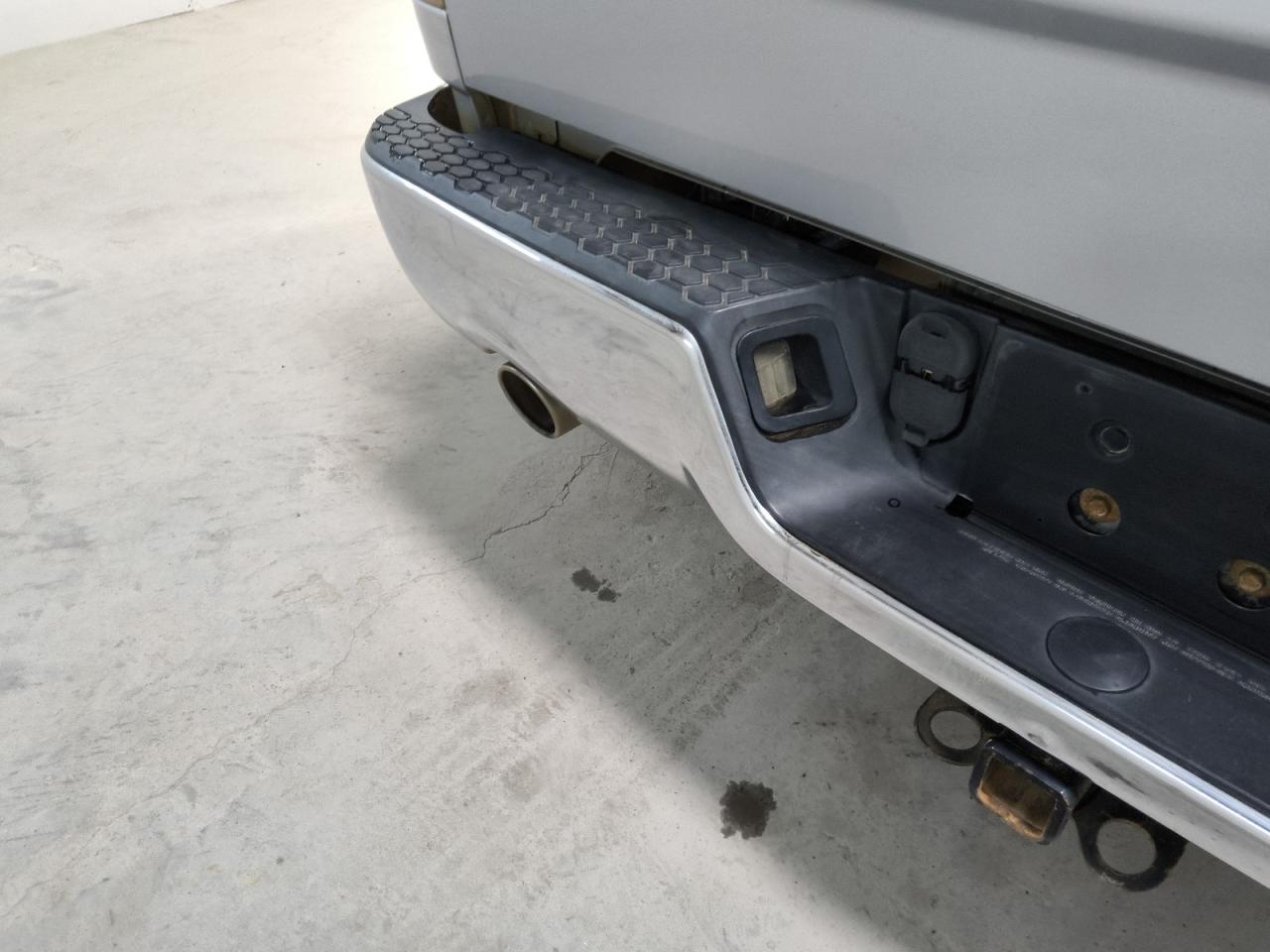2017 Ram 1500 Laramie Silver vin: 1C6RR7NT8HS507888 Damage: Rear Metal Bumper Chrome, Dent(S) W/No Paint Dmg, 1/2 To 1 Inch