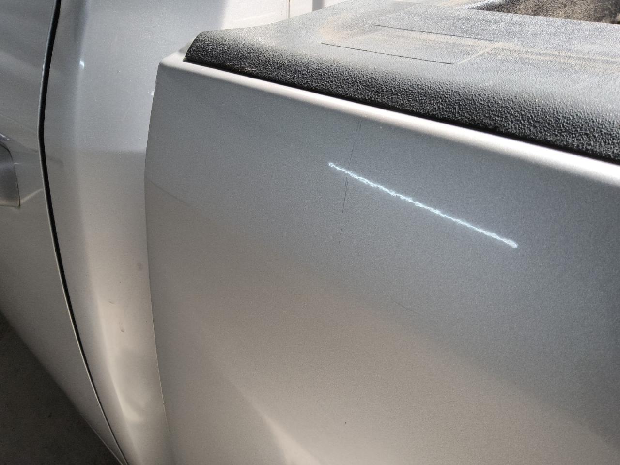 2017 Ram 1500 Laramie Silver vin: 1C6RR7NT8HS507888 Damage: Left Bed Side, Heavy Scratch, 1 To 2 Inches