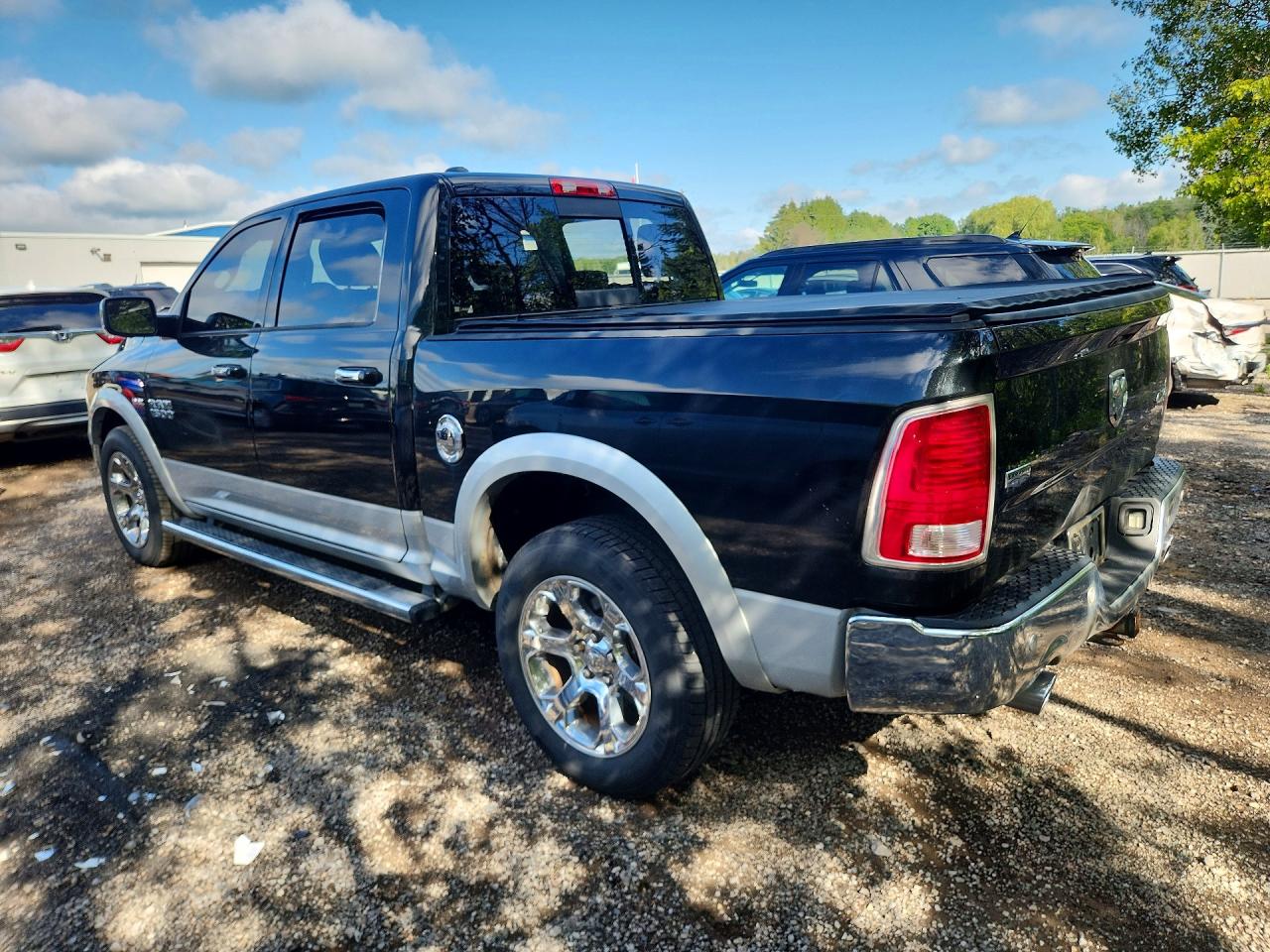 2015 Ram 1500 Laramie Black vin: 1C6RR7NT9FS596447