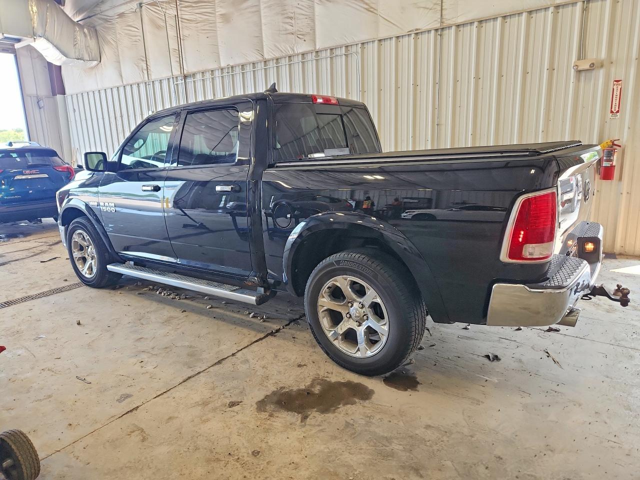 2013 Ram 1500 Laramie Black vin: 1C6RR7NTXDS654580