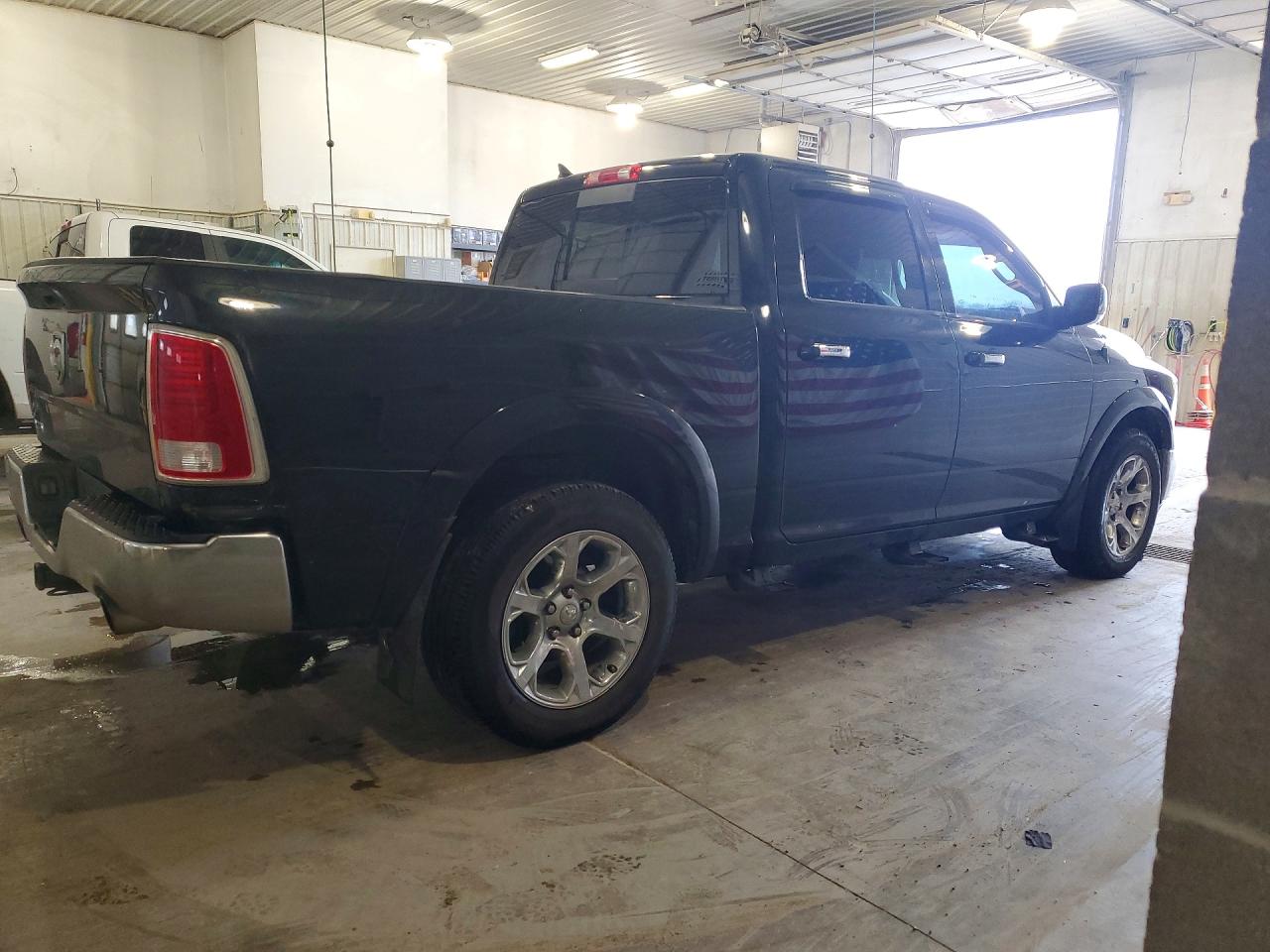 2014 Ram 1500 Laramie Черный vin: 1C6RR7NTXES232777