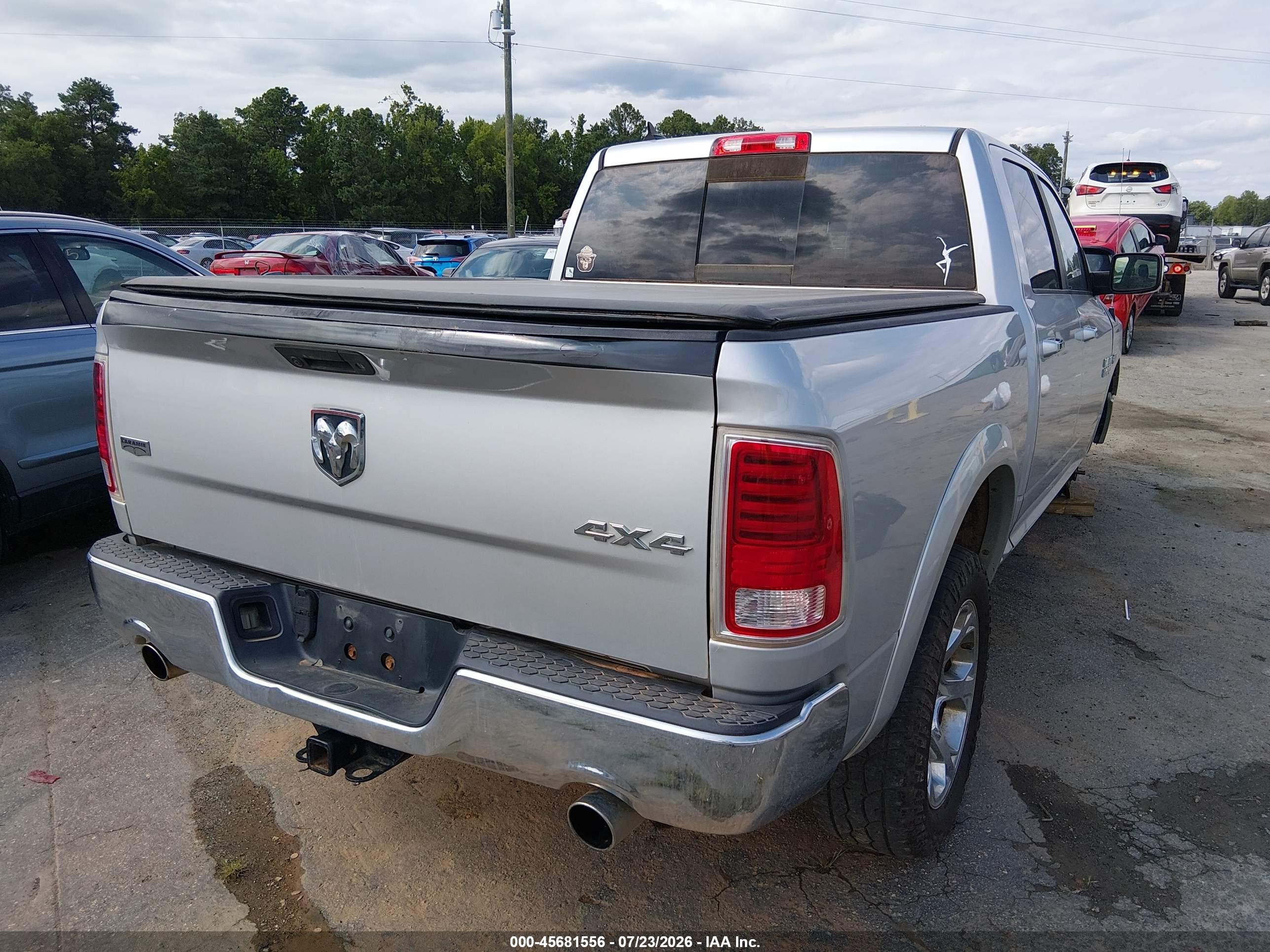 2014 Ram 1500 Laramie Silver vin: 1C6RR7NTXES316467