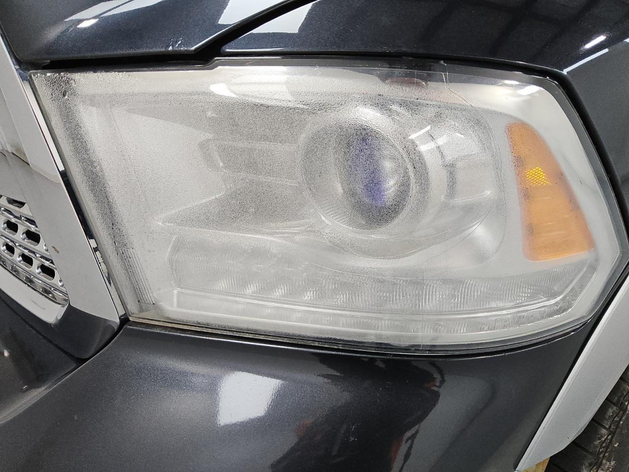 2014 Ram 1500 Laramie Black vin: 1C6RR7NTXES434079 Damage: Left Head Lamp, Water Damage, Replacement Required