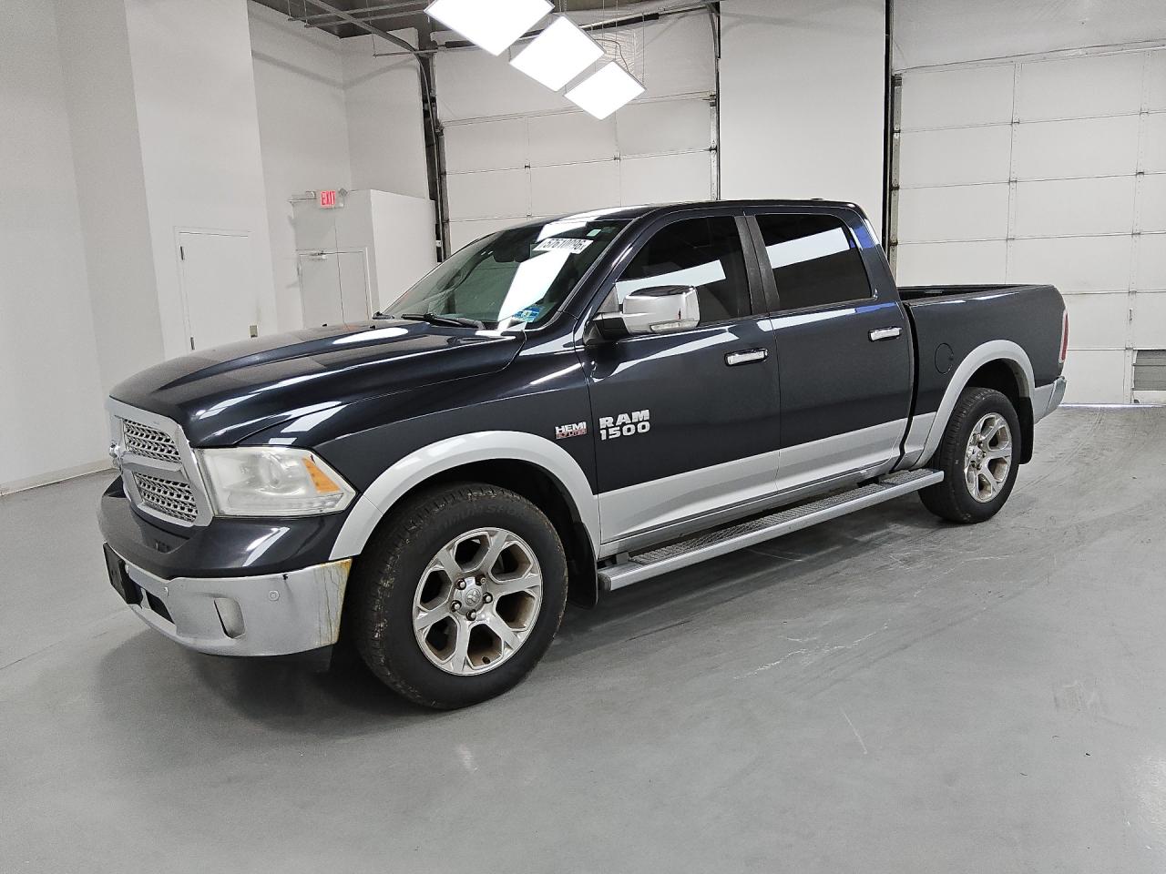 2014 Ram 1500 Laramie Black vin: 1C6RR7NTXES434079 Damage: Front Metal Bumper Chrome, Rust, Severe Damage