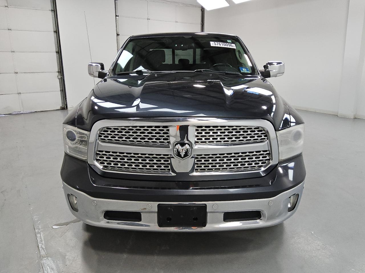 2014 Ram 1500 Laramie Black vin: 1C6RR7NTXES434079 Damage: Hood, Heavy Scratch, > 12 Inches