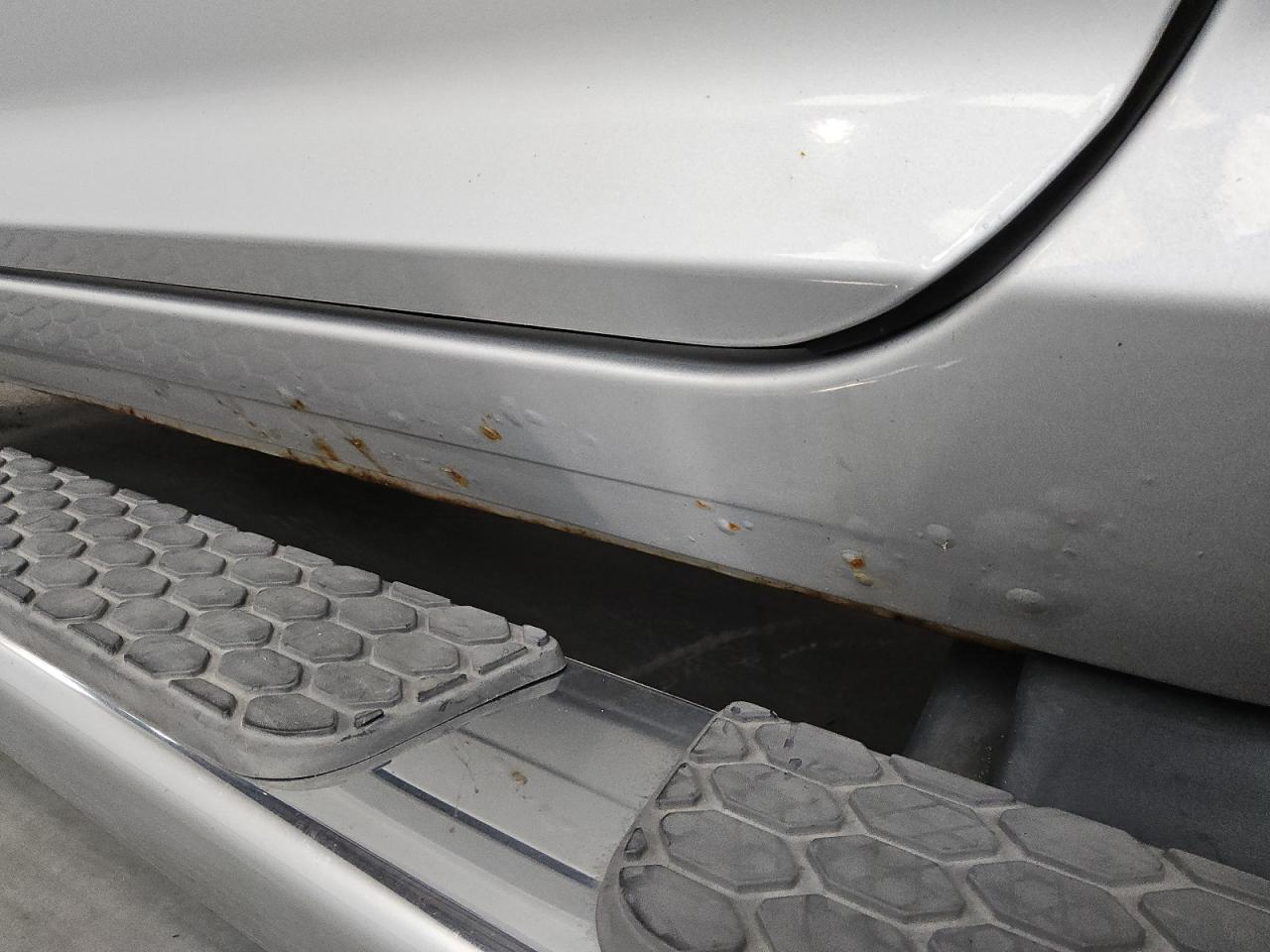 2014 Ram 1500 Laramie Black vin: 1C6RR7NTXES434079 Damage: Left Rocker Panel, Rust, > 12 Inches