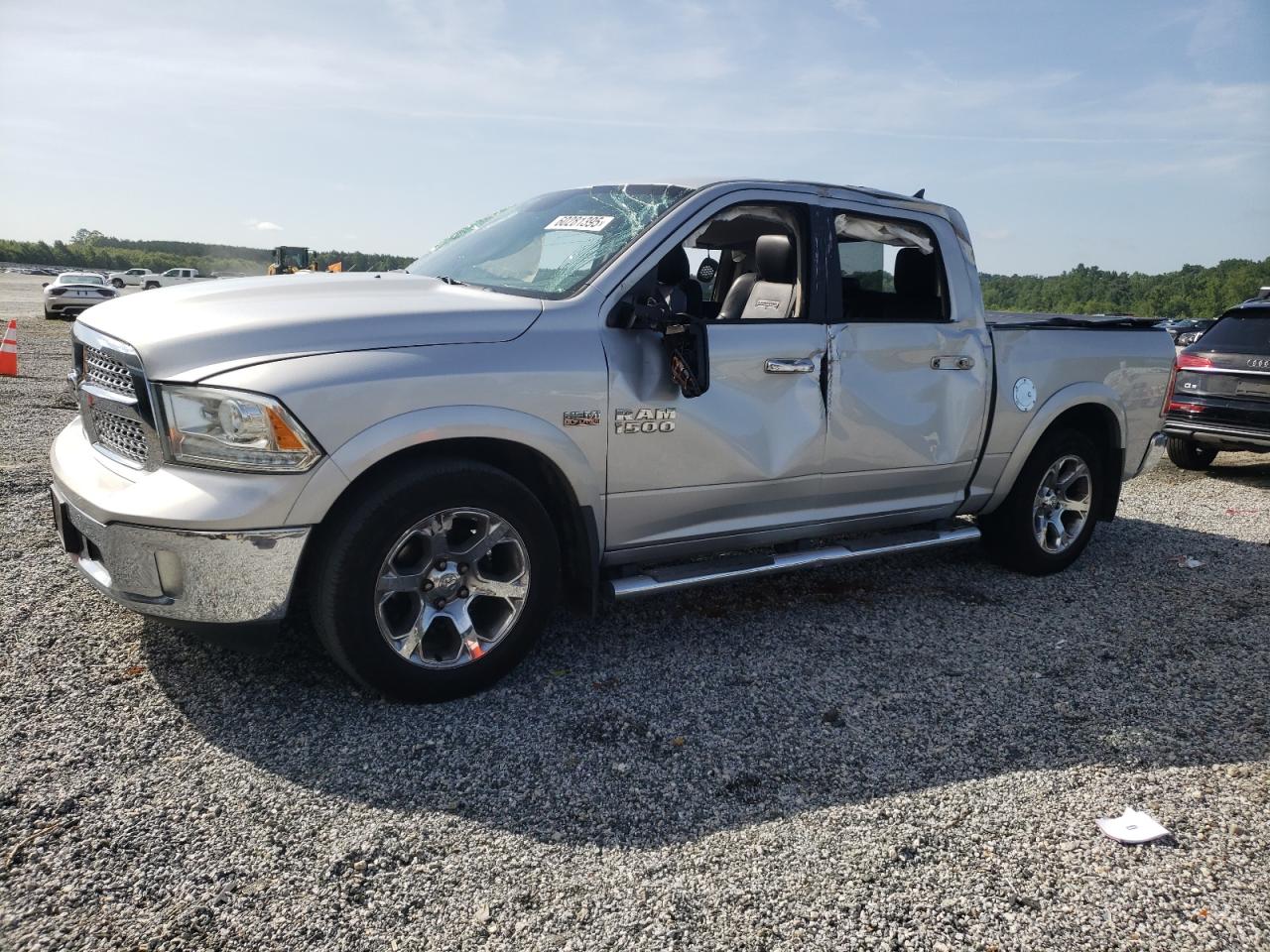 2014 Ram 1500 Laramie Silver vin: 1C6RR7NTXES453022