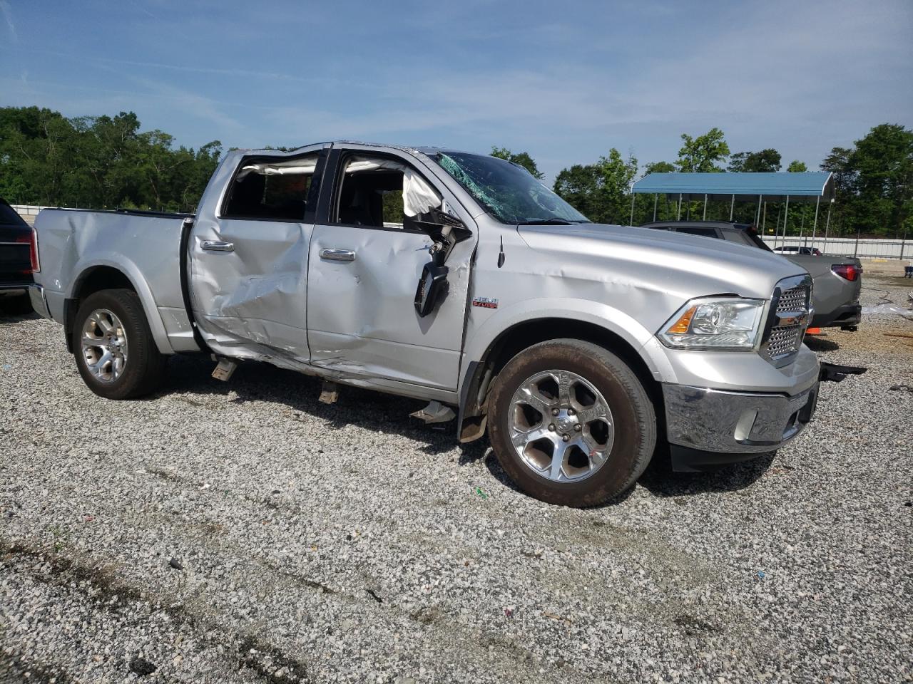 2014 Ram 1500 Laramie Silver vin: 1C6RR7NTXES453022