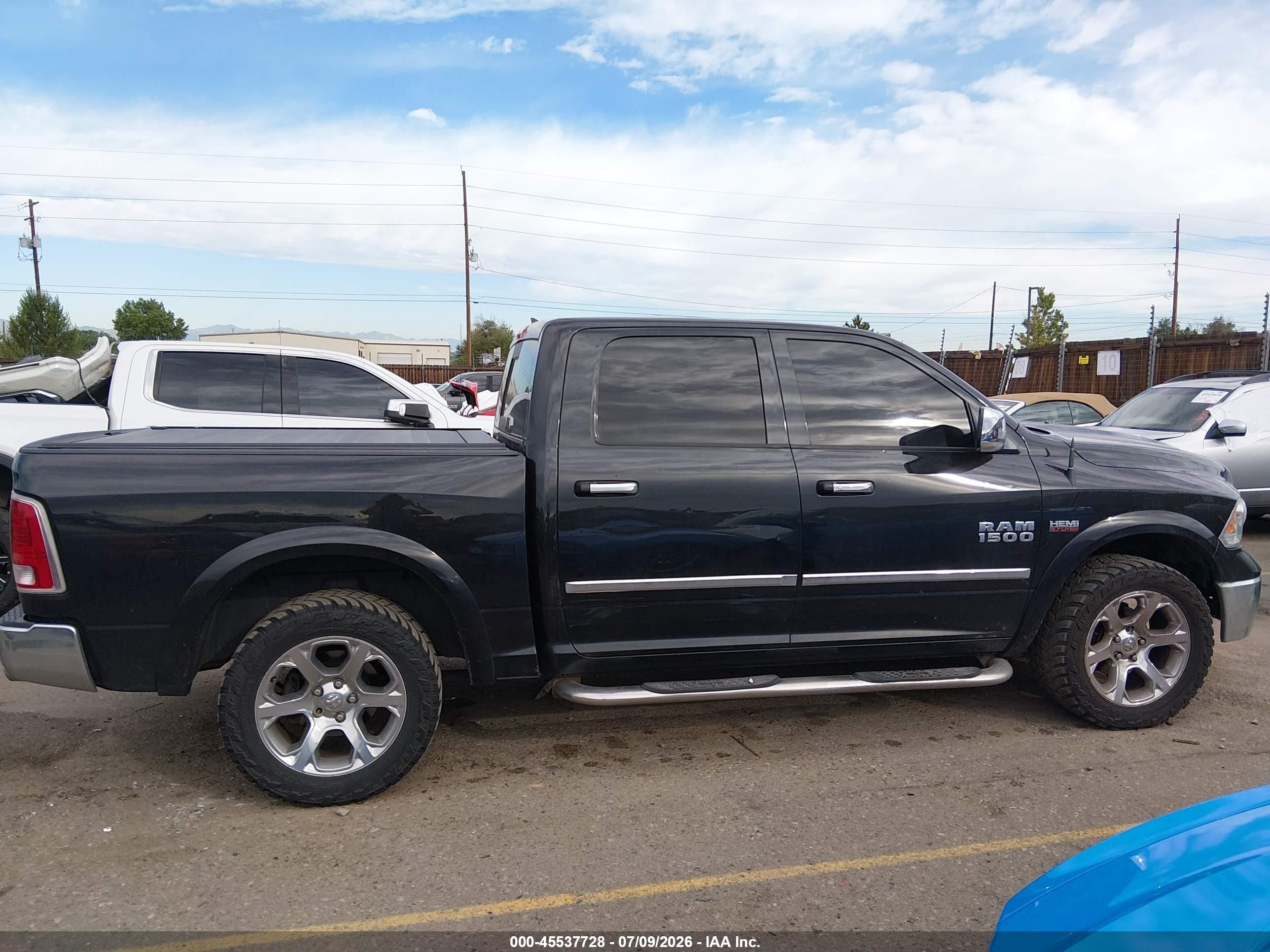 2015 Ram 1500 Laramie Black vin: 1C6RR7NTXFS738479