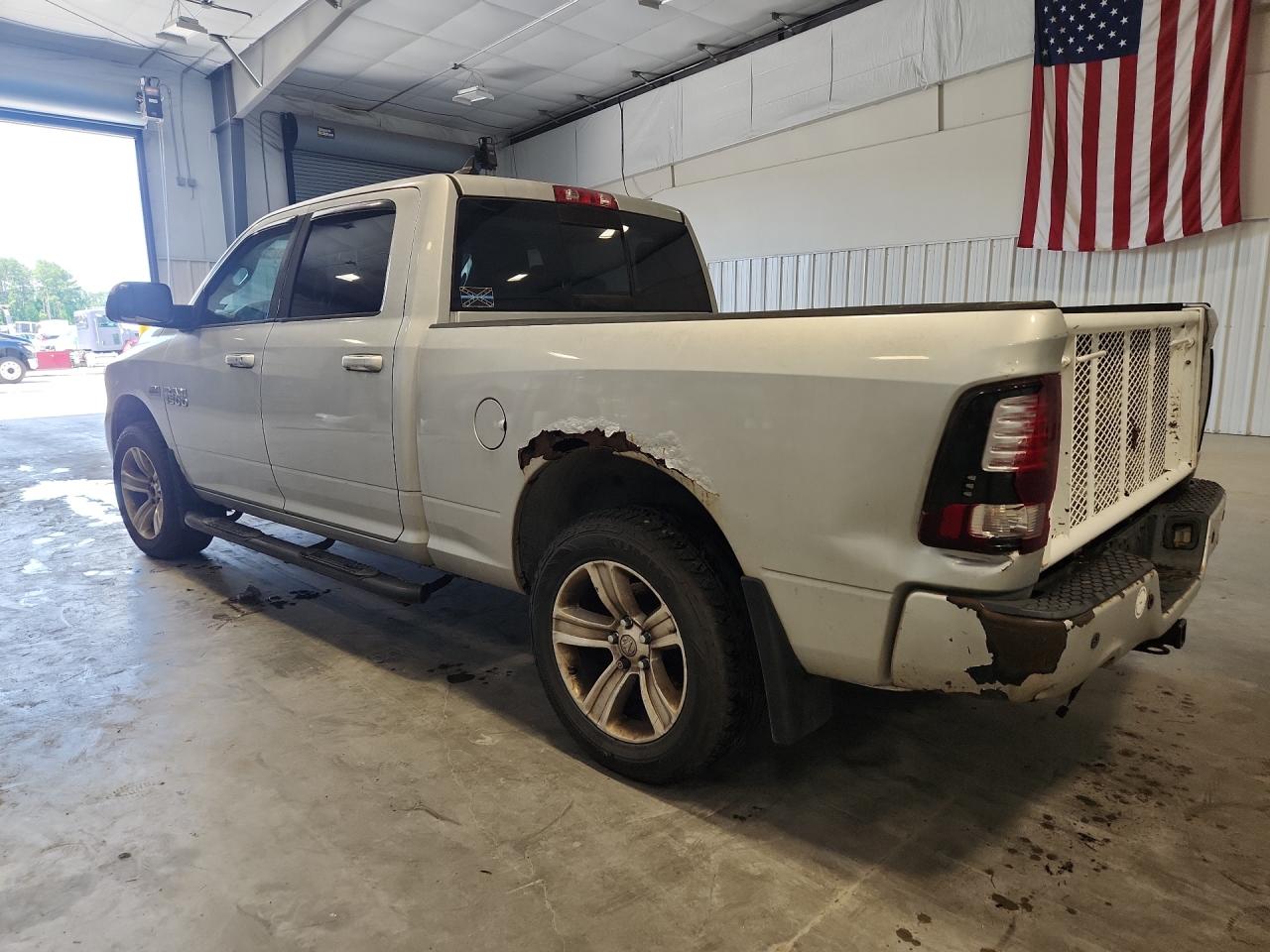 2013 Ram 1500 Sport Silver vin: 1C6RR7UT3DS663526 Damage: Tailgate, Aftermarket, Replacement Required