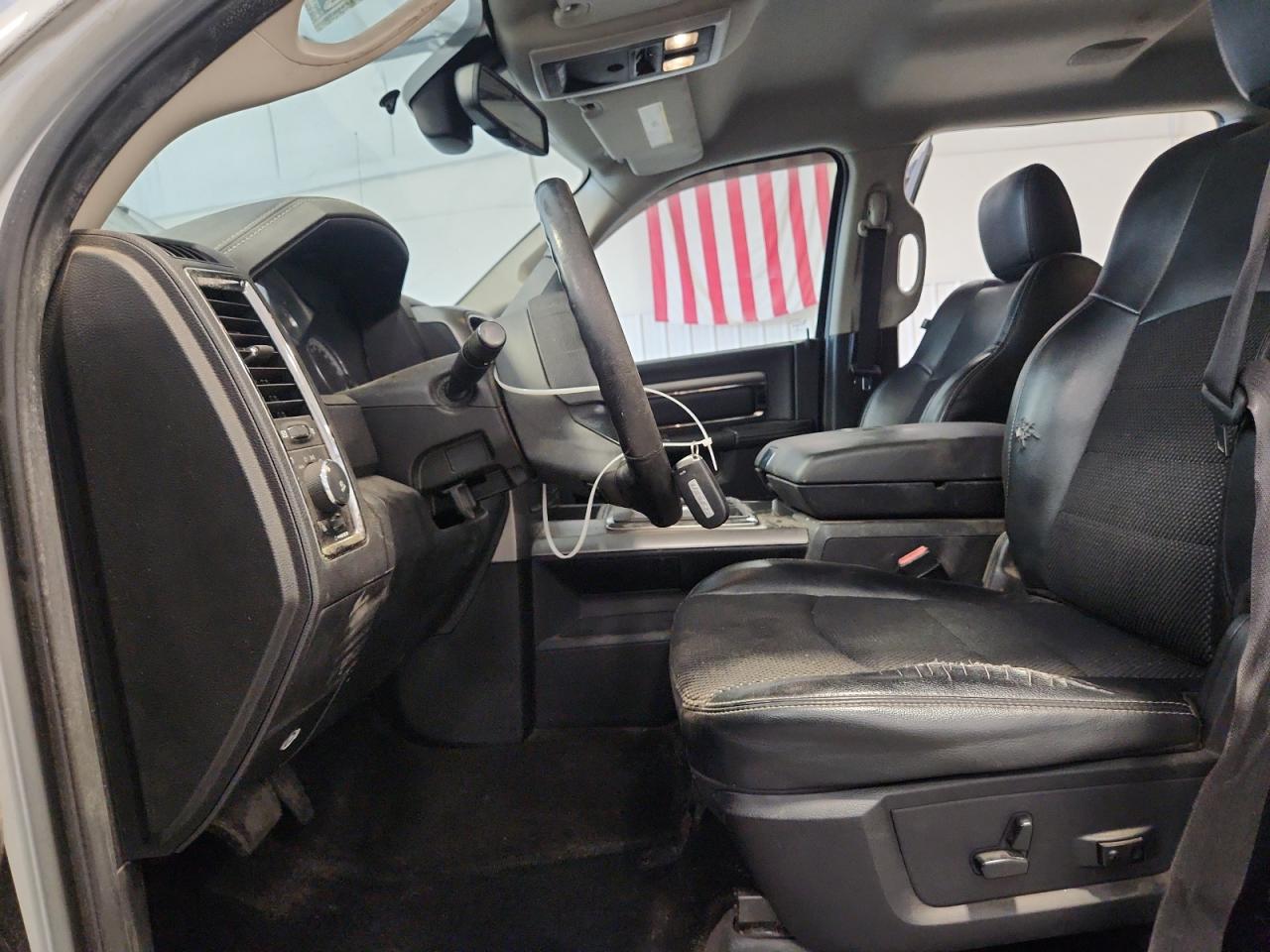2013 Ram 1500 Sport Silver vin: 1C6RR7UT3DS663526 Damage: Left Front Seat, Torn, > 12 Inches