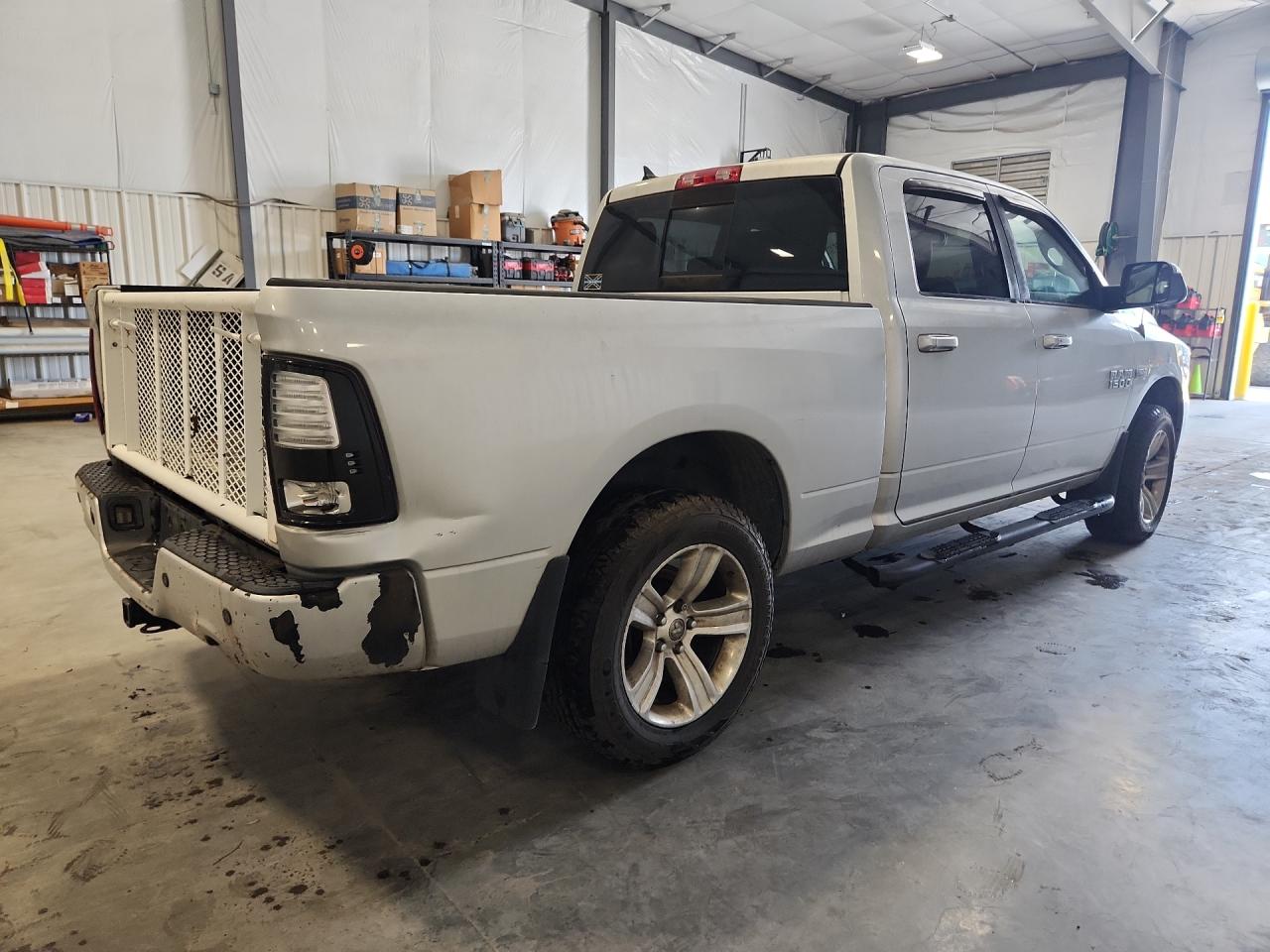 2013 Ram 1500 Sport Silver vin: 1C6RR7UT3DS663526 Damage: Right Bed Side, Dent(S) W/ Paint Dmg, 7 To 8 Inches