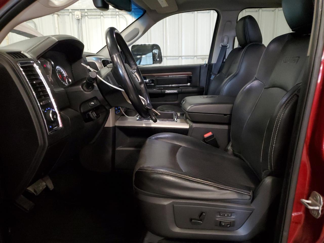 2014 Ram 1500 Laramie Maroon vin: 1C6RR7VT3ES141544 Damage: Left Front Seat Cushion, Worn, Replacement Required