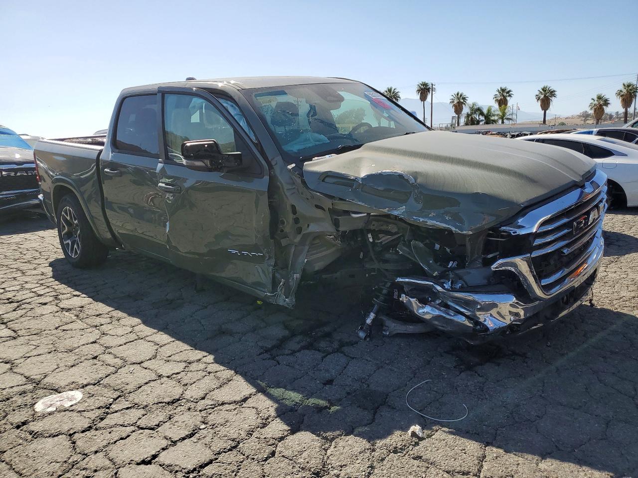 2026 Ram 1500 Laramie Green vin: 1C6SRFJP5TN281949