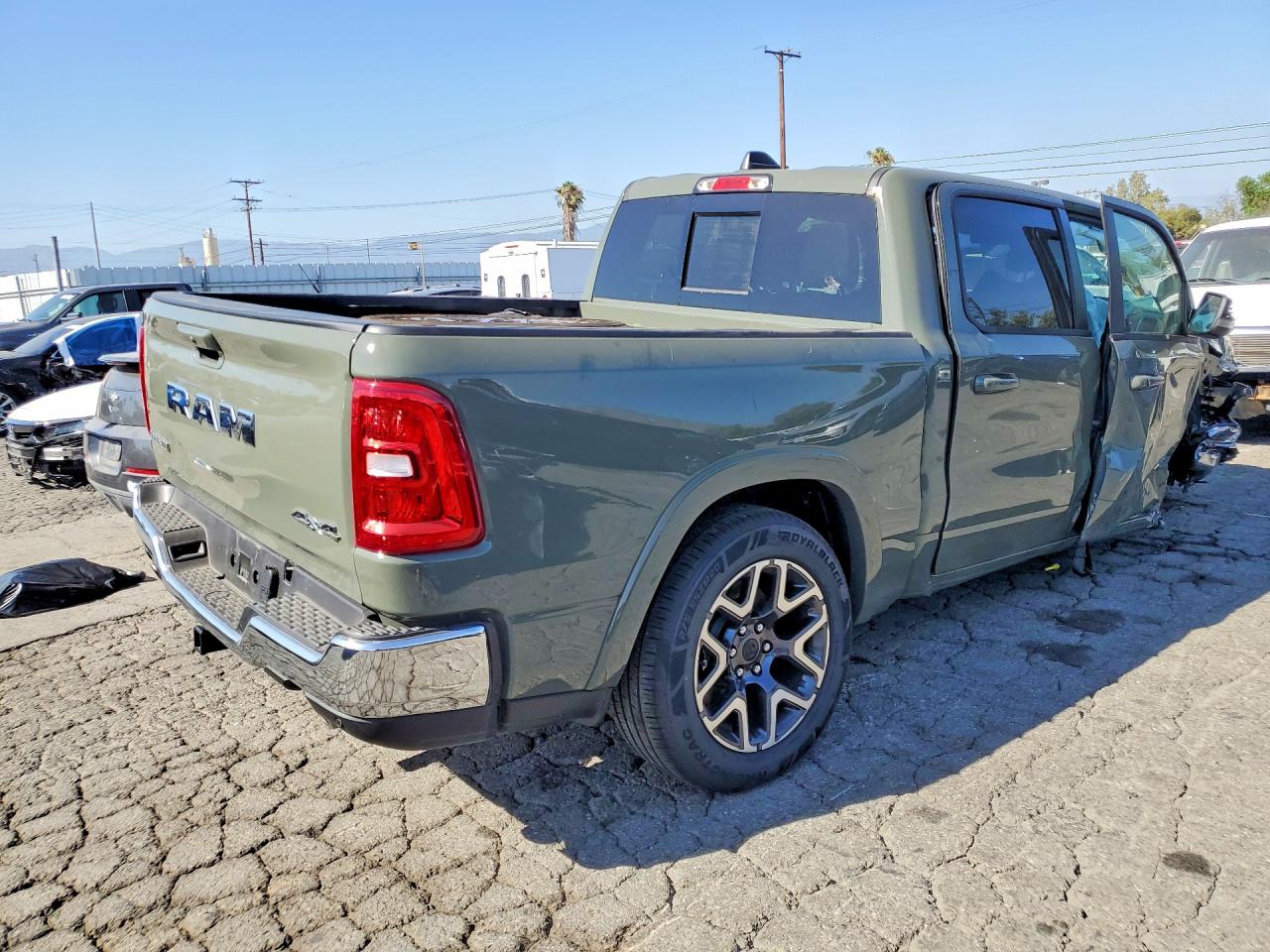 2026 Ram 1500 Laramie Green vin: 1C6SRFJP5TN281949