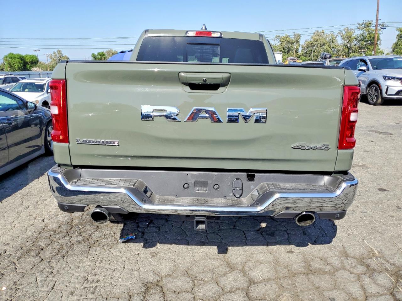 2026 Ram 1500 Laramie Green vin: 1C6SRFJP5TN281949