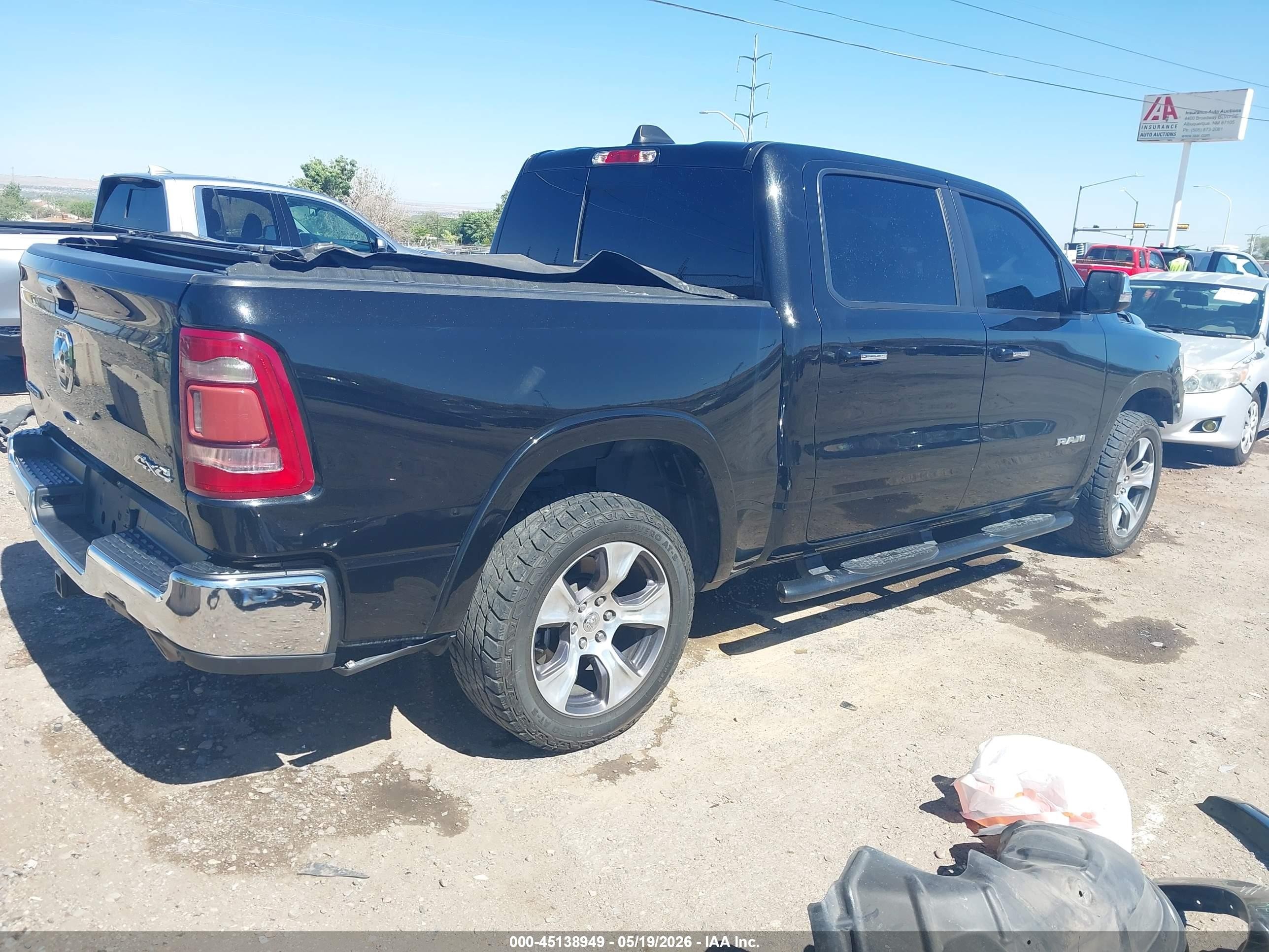 2019 Ram 1500 Laramie  4x4 5'7 Box Black vin: 1C6SRFJT2KN677509