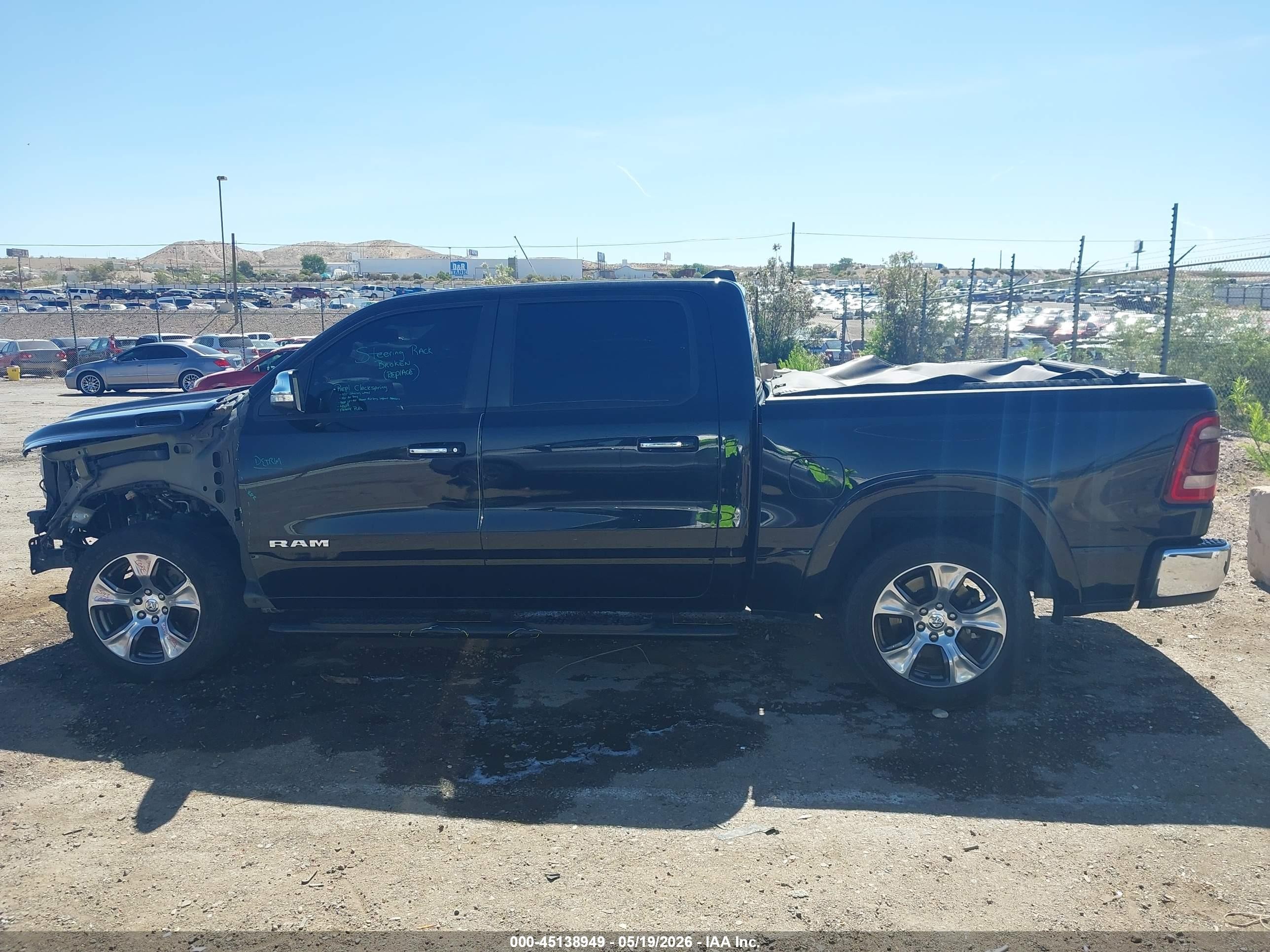 2019 Ram 1500 Laramie  4x4 5'7 Box Black vin: 1C6SRFJT2KN677509