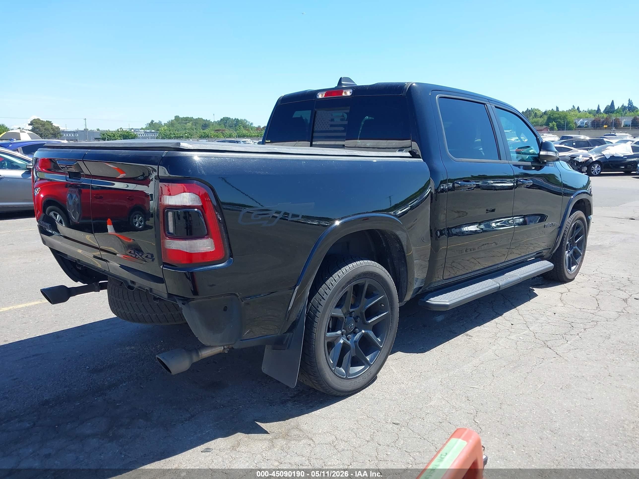 2022 Ram 1500 Laramie  4x4 5'7 Box Black vin: 1C6SRFJT2NN344666