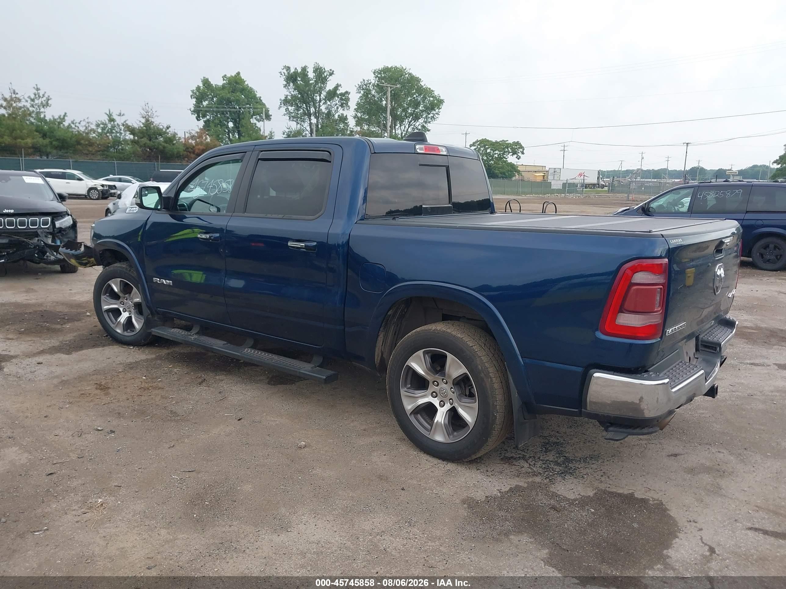 2020 Ram 1500 Laramie  4x4 5'7 Box Dark Blue vin: 1C6SRFJT5LN222476