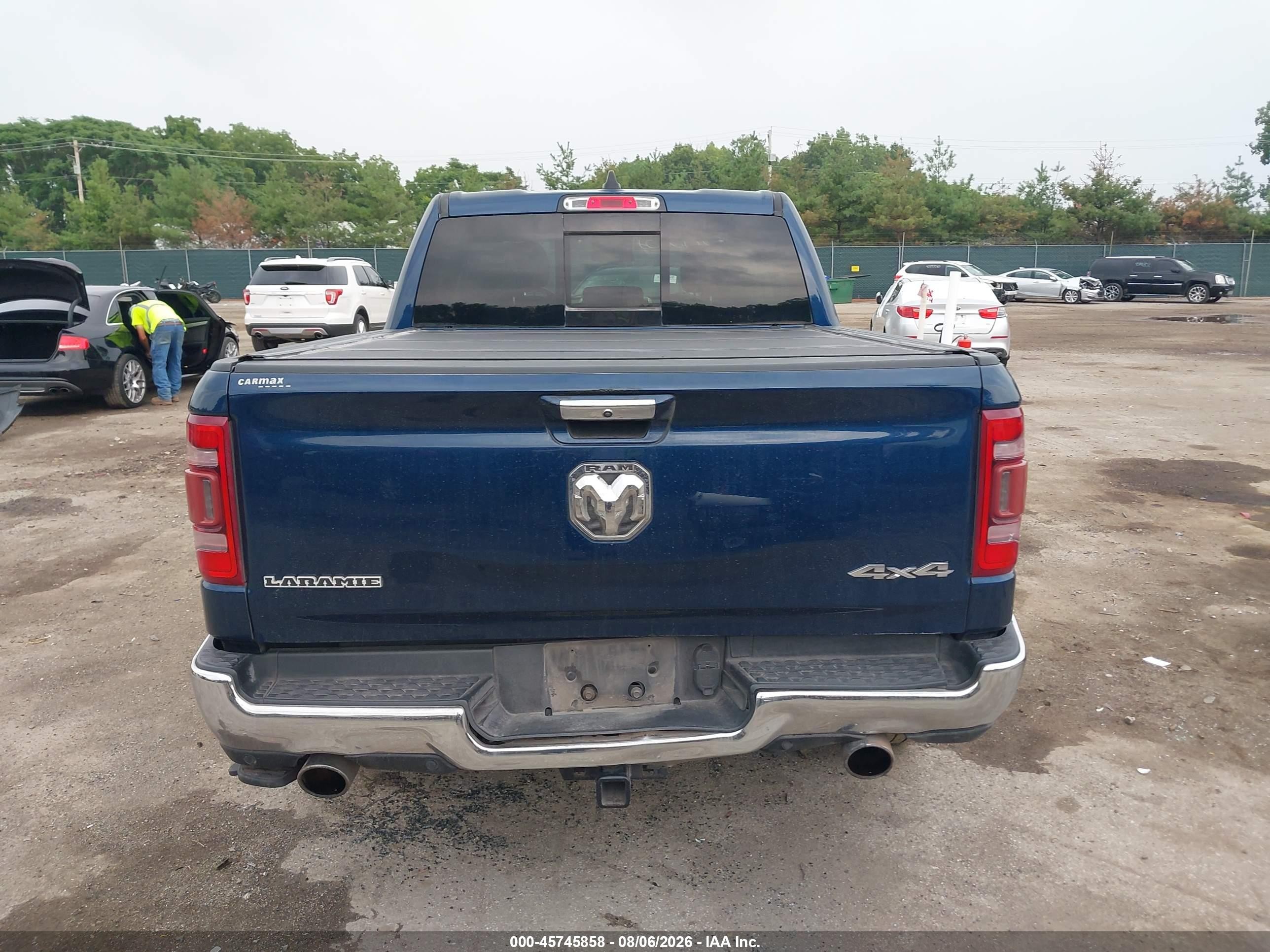 2020 Ram 1500 Laramie  4x4 5'7 Box Dark Blue vin: 1C6SRFJT5LN222476