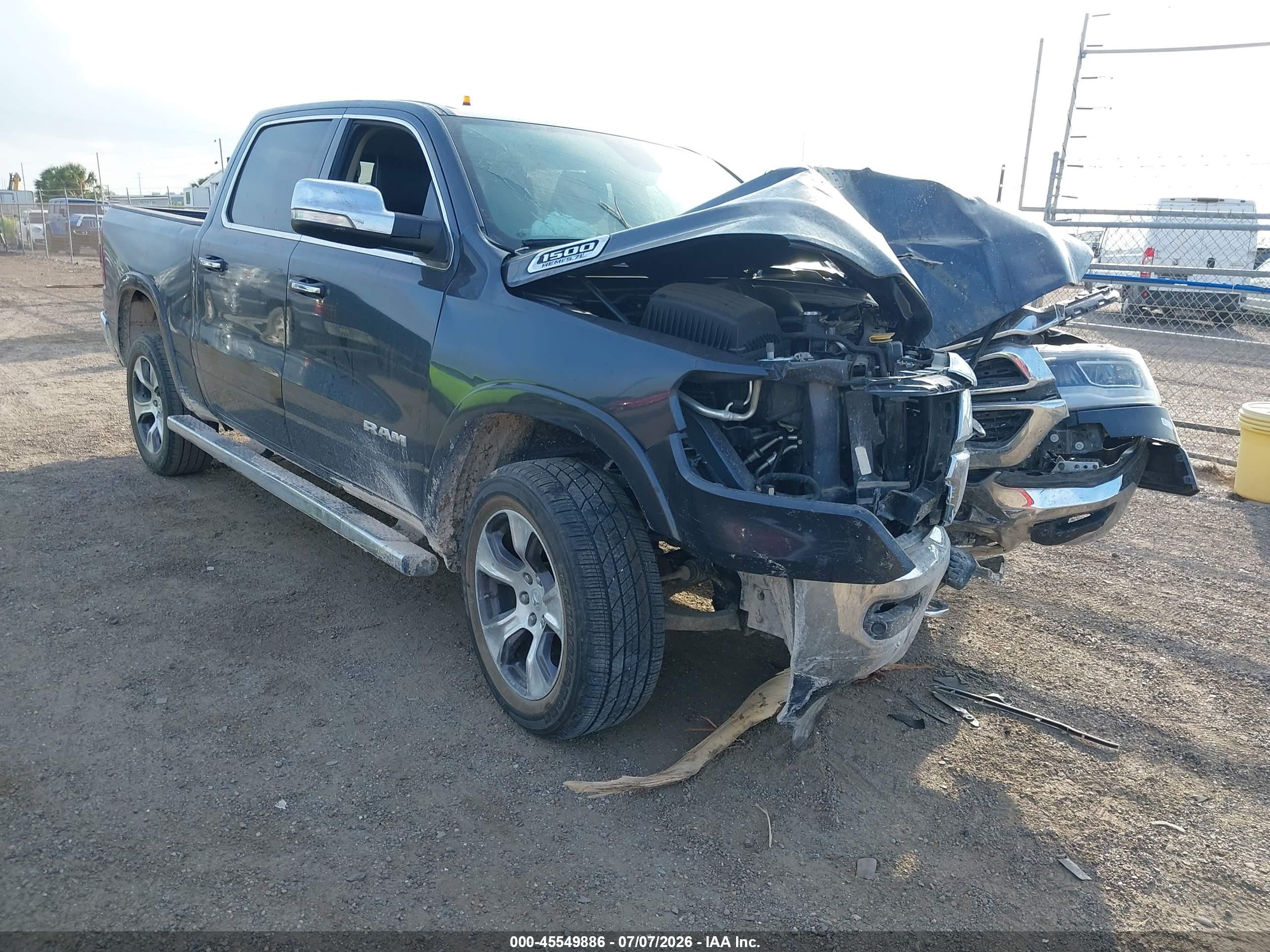 2020 Ram 1500 Laramie  4x4 5'7 Box Blue vin: 1C6SRFJT6LN325650