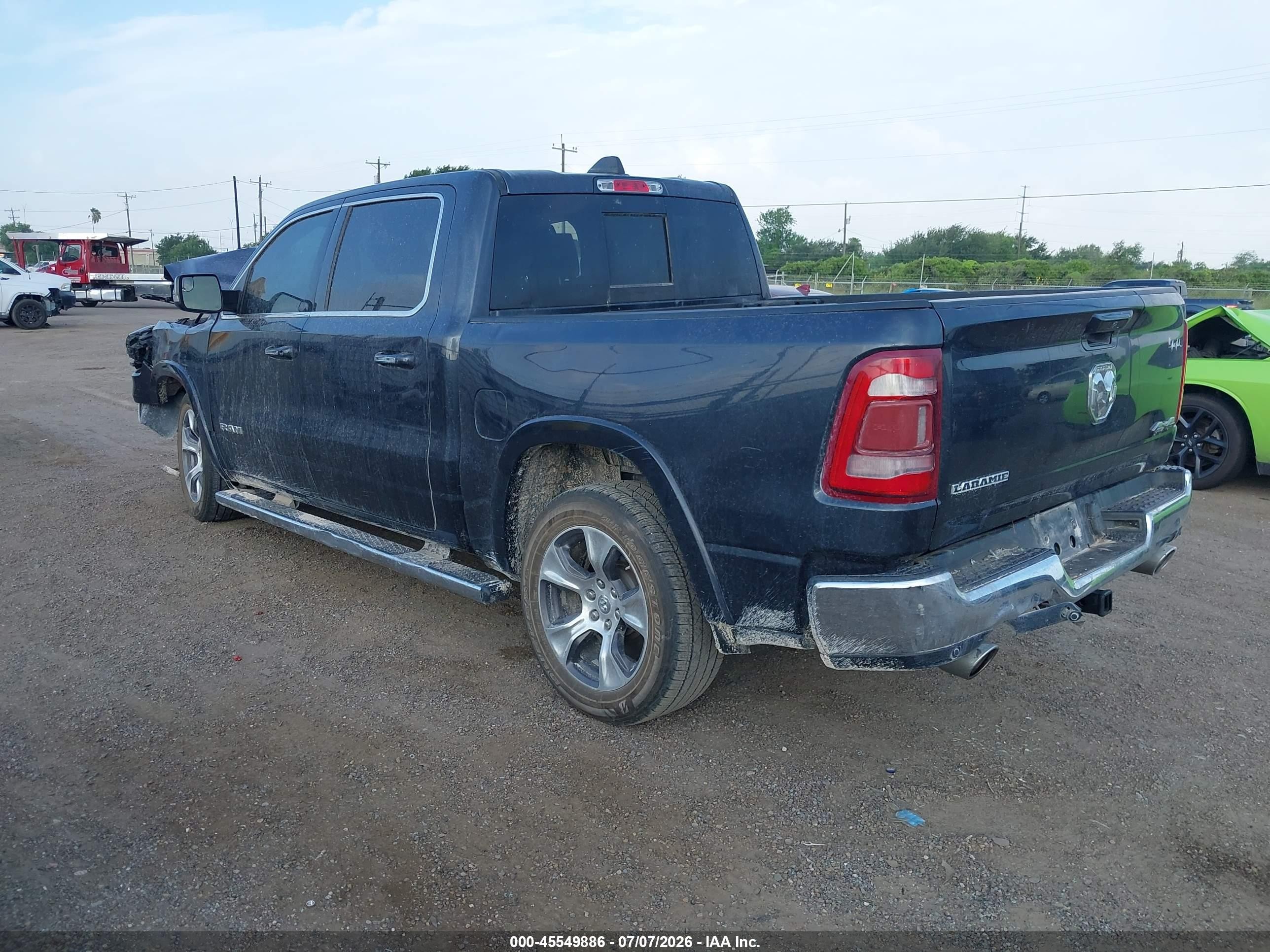 2020 Ram 1500 Laramie  4x4 5'7 Box Blue vin: 1C6SRFJT6LN325650