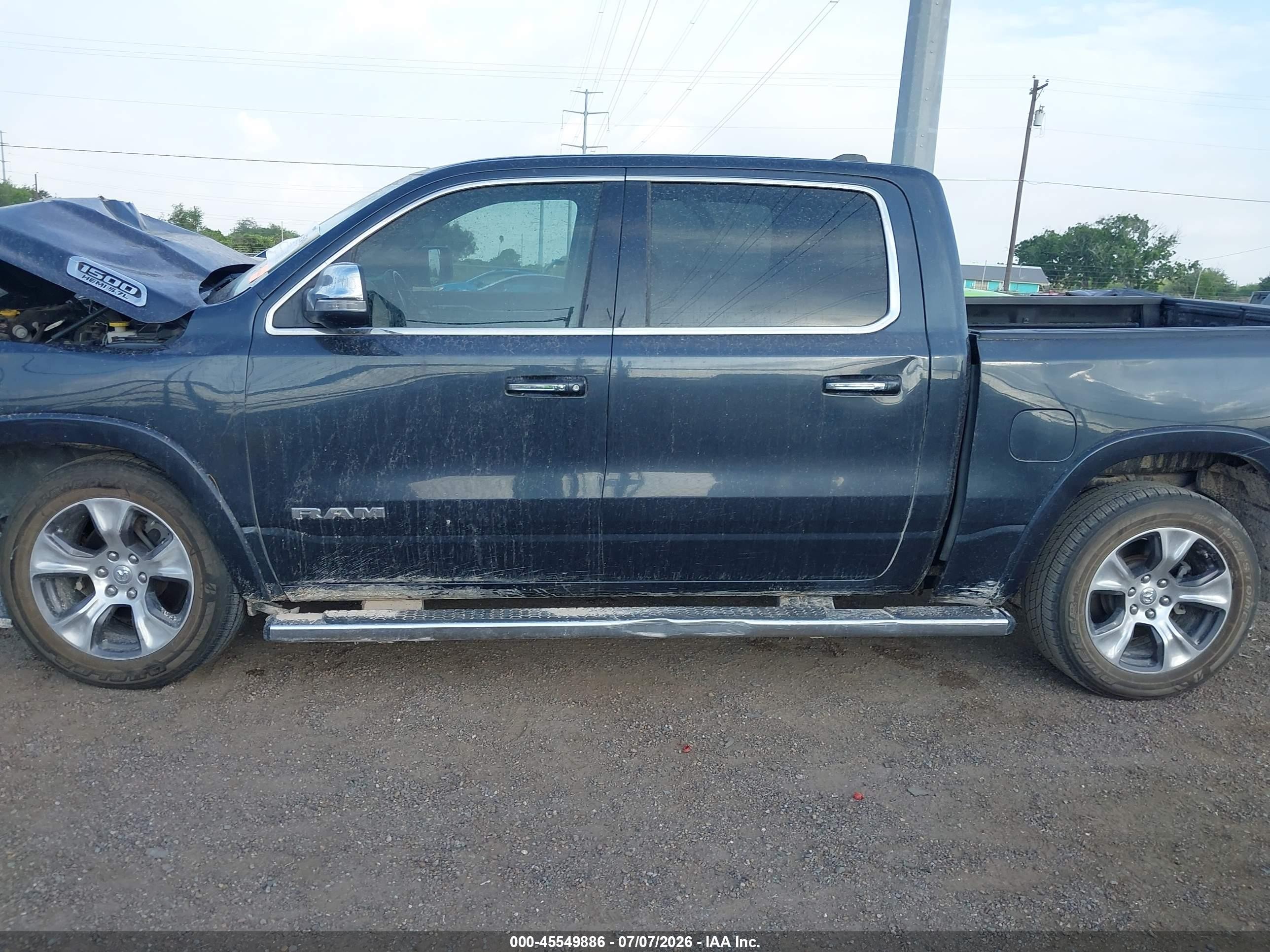 2020 Ram 1500 Laramie  4x4 5'7 Box Blue vin: 1C6SRFJT6LN325650