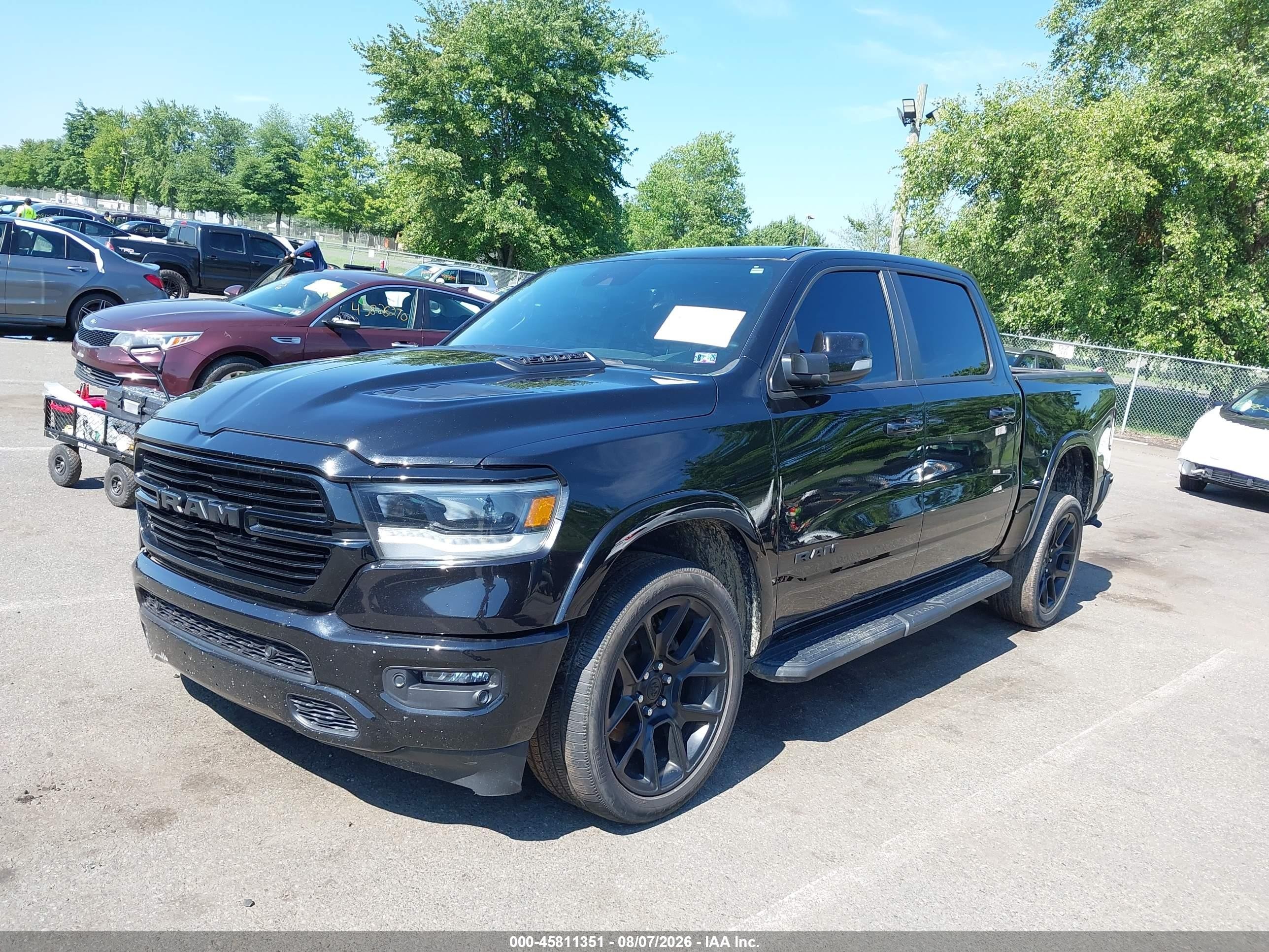 2022 Ram 1500 Laramie  4x4 5'7 Box Black vin: 1C6SRFJT7NN285906