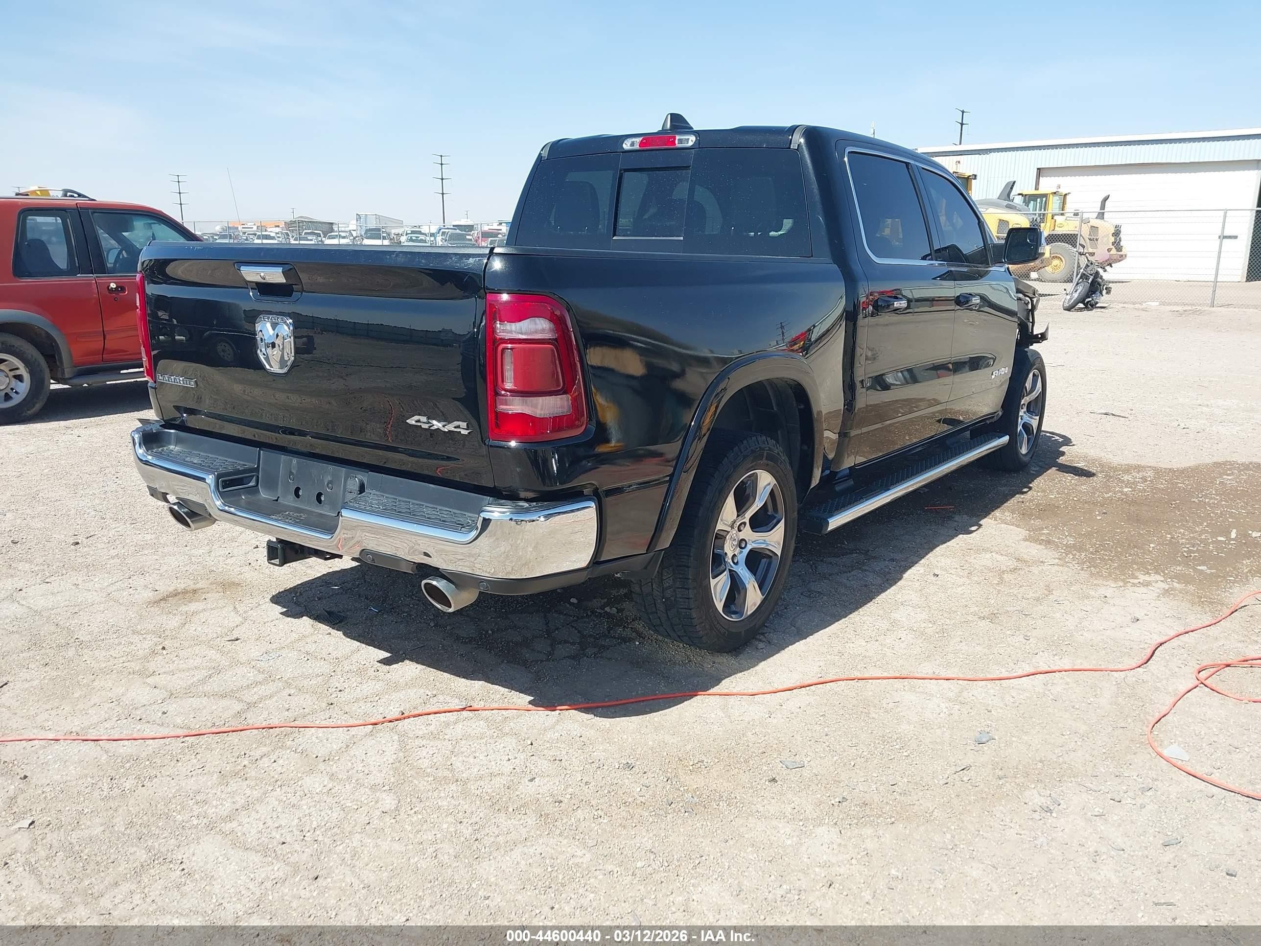 2020 Ram 1500 Laramie  4x4 5'7 Box Black vin: 1C6SRFJT8LN379032