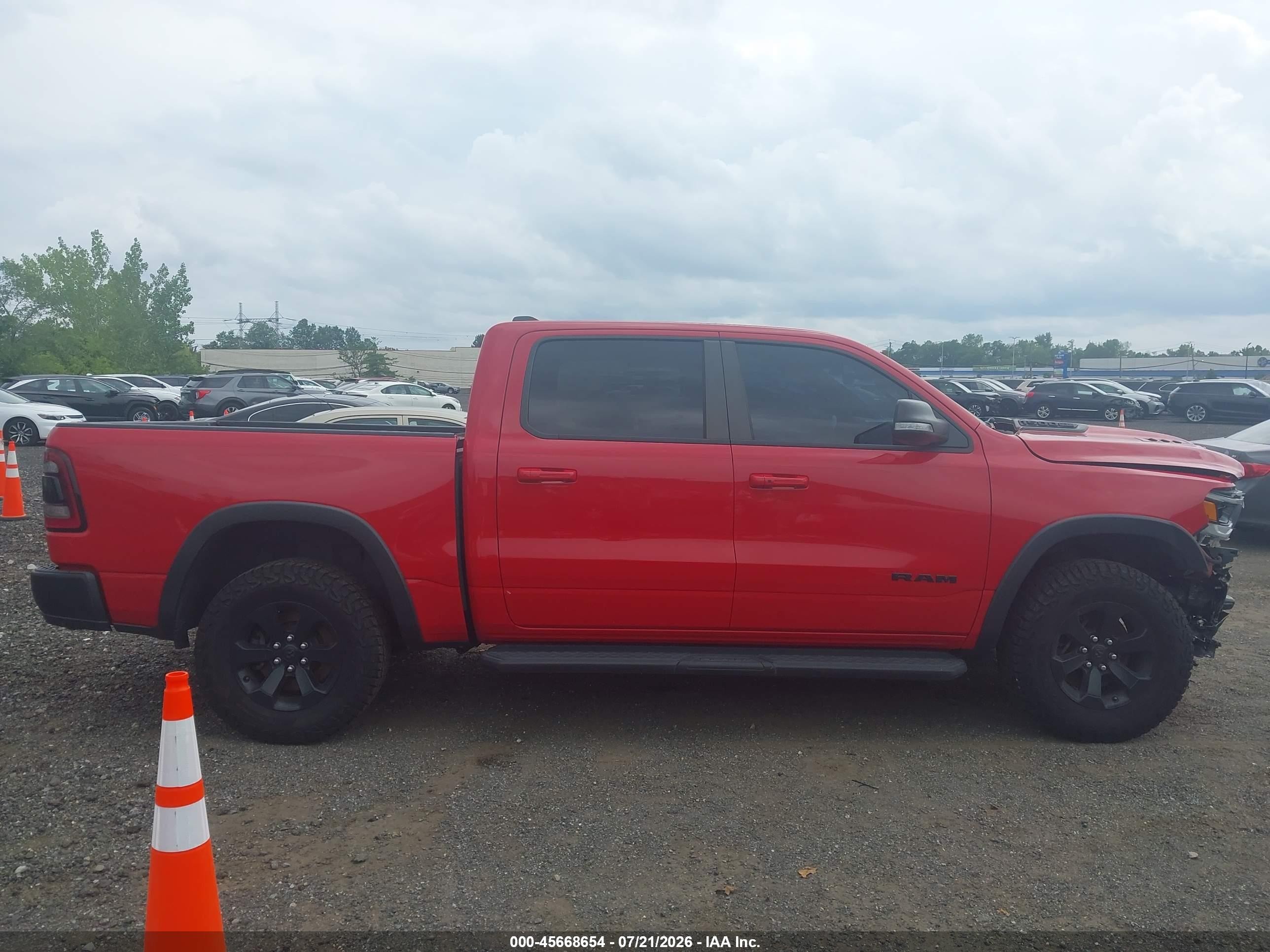 2022 Ram 1500 Rebel  4x4 5'7 Box Red vin: 1C6SRFLT2NN100786