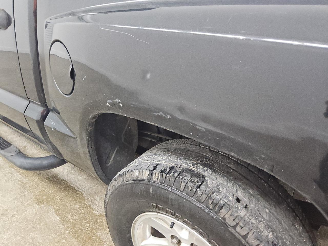 2010 Dodge Dakota Sxt Black vin: 1D7CW3GK7AS222891 Damage: Left Bed Side, Dent(S) W/ Paint Dmg, 5 To 6 Inches