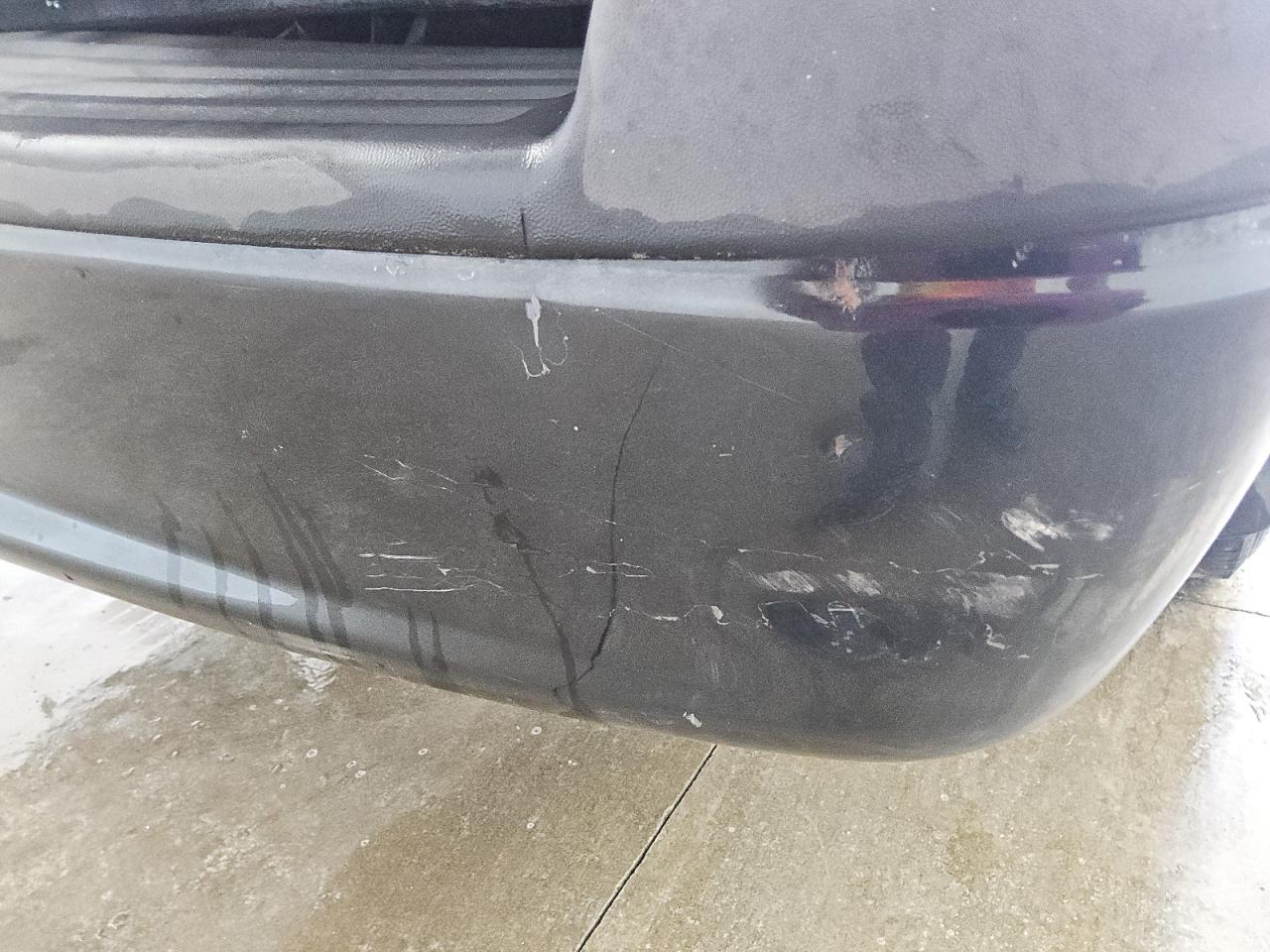 2010 Dodge Dakota Sxt Black vin: 1D7CW3GK7AS222891 Damage: Rear Metal Bumper Painted, Dent(S) W/ Paint Dmg, 8 To 9 Inches